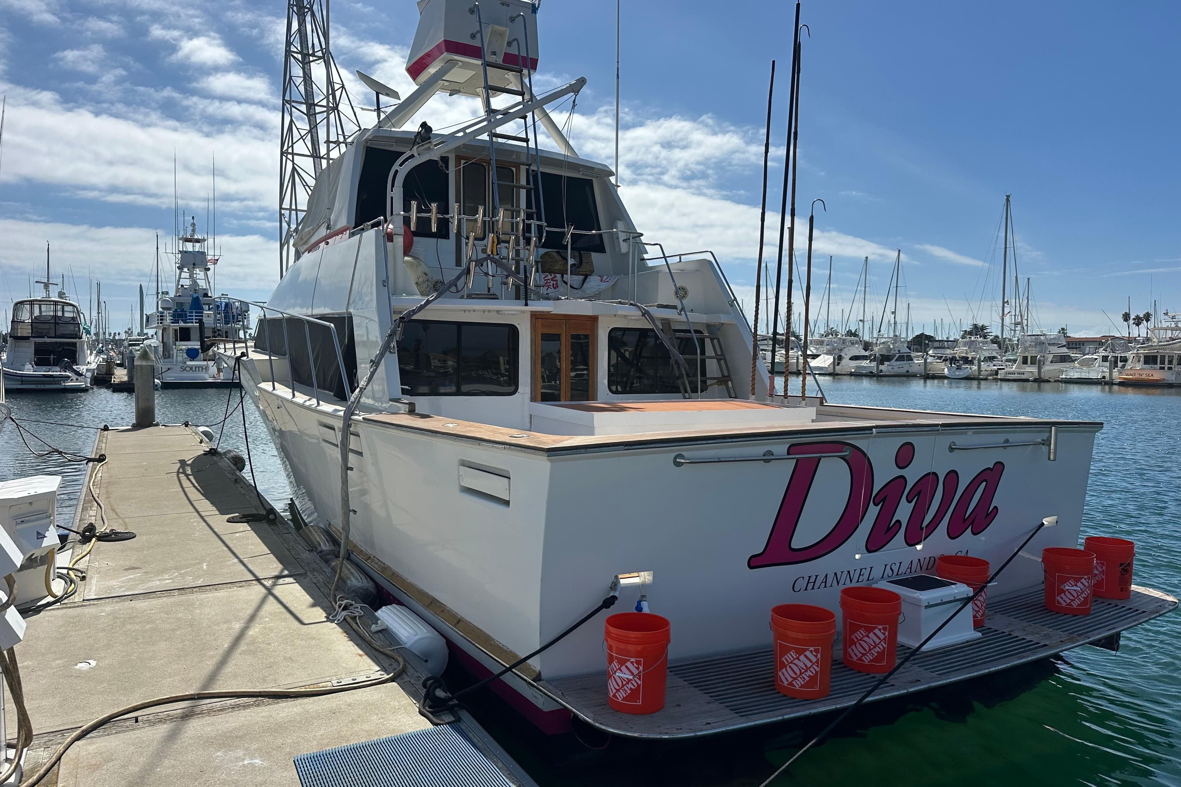1973 Elliott Yachtfisher "Diva" docked at marina, Channel Islands, sunny day.