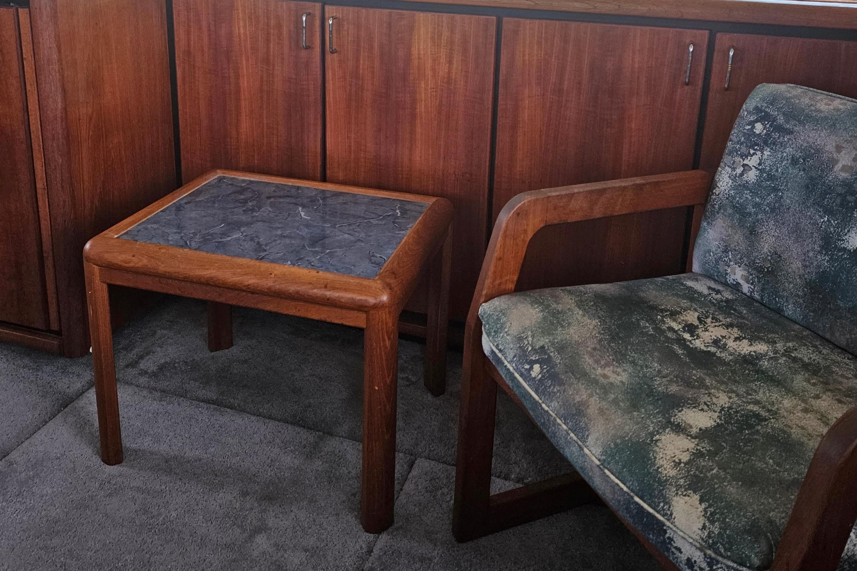 Interior of 1992 Bayliner 4588 Pilothouse MY with wooden table and upholstered chair.