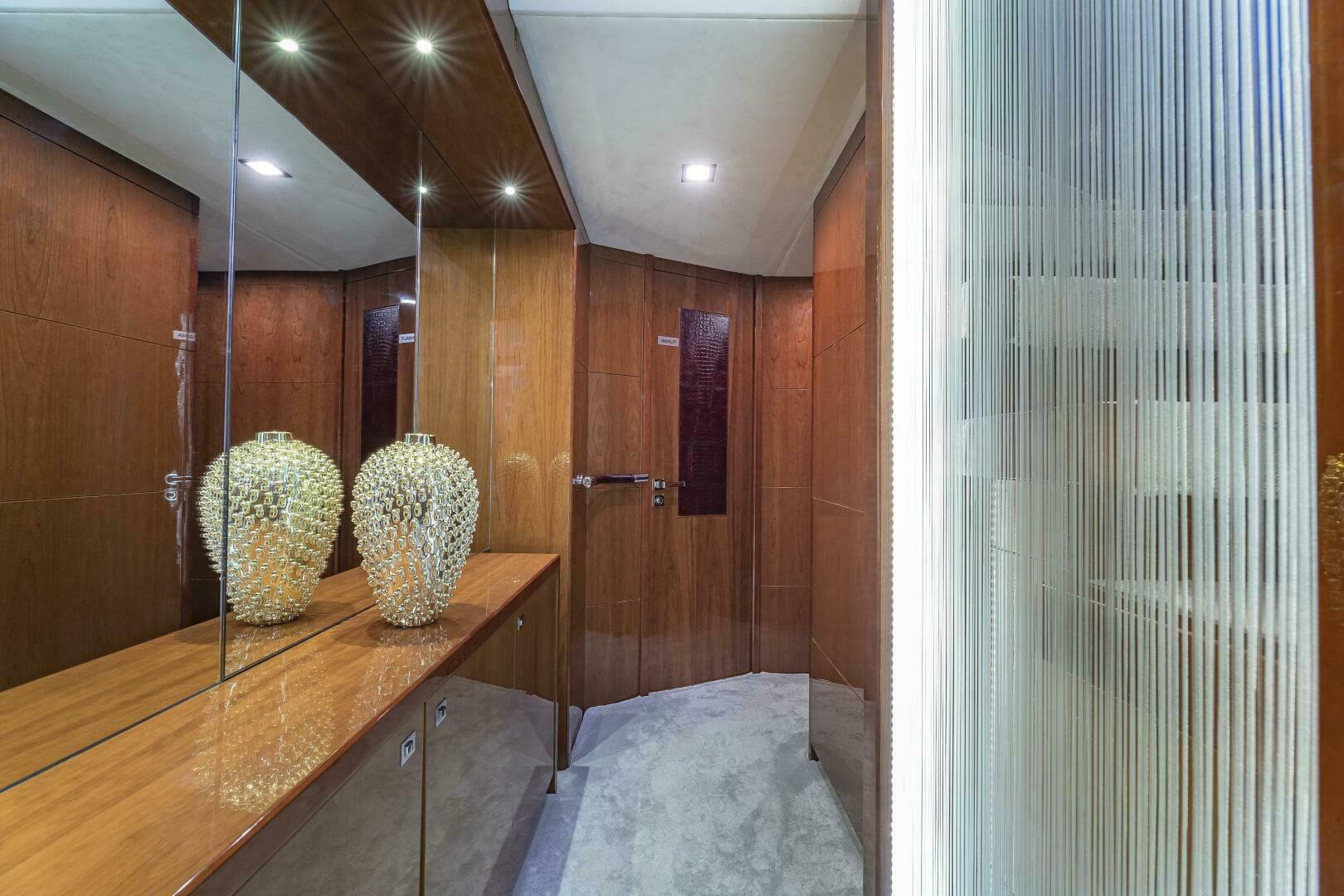 Luxurious interior of 2012 Princess 32M yacht with elegant wooden finishes and modern decor.