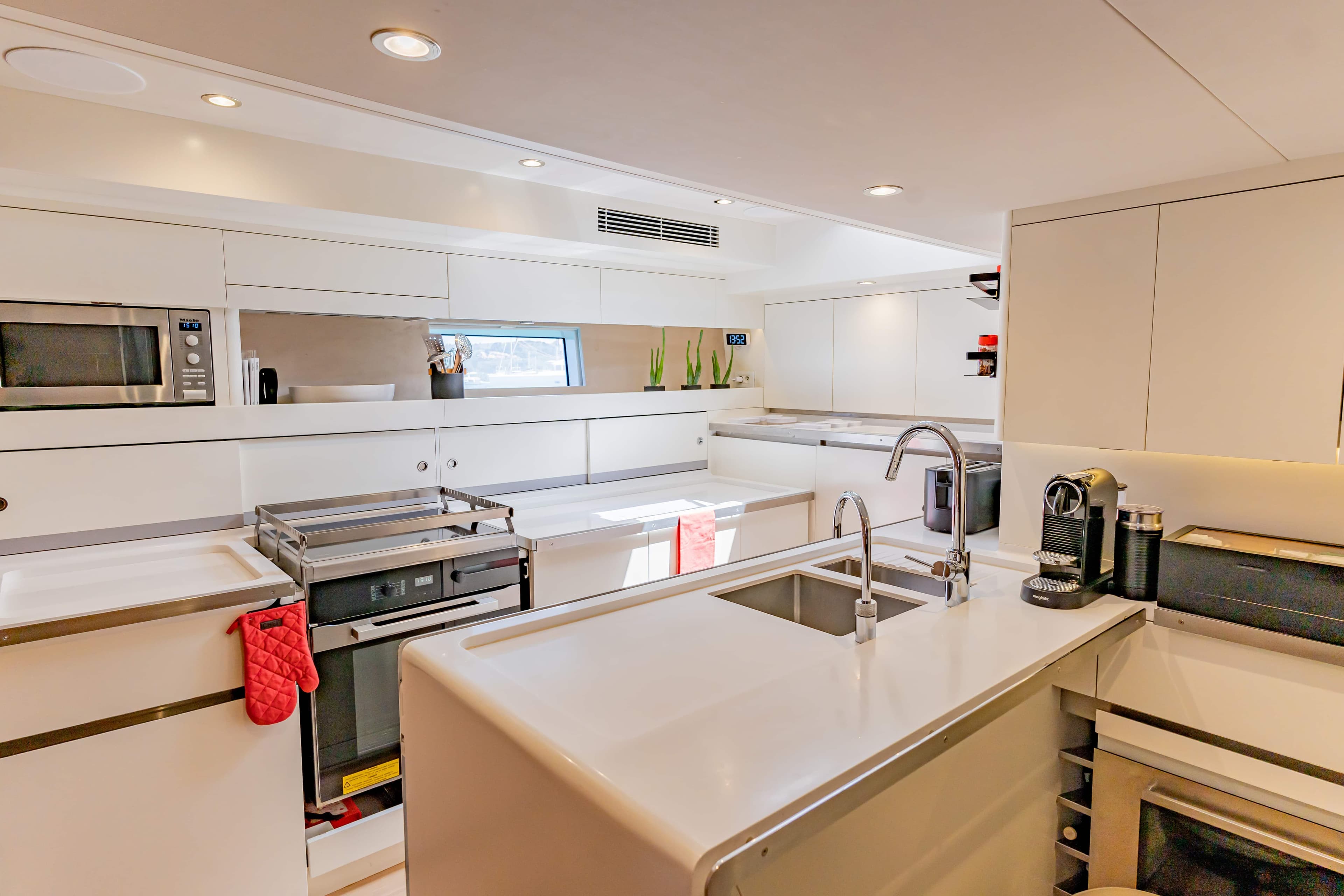Modern kitchen on a 2021 CNB 76 yacht.