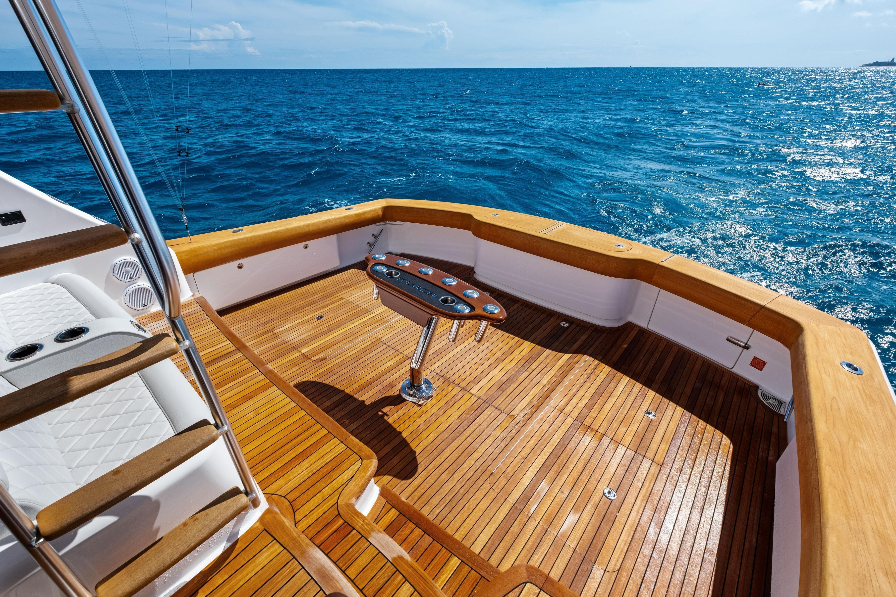 Luxurious 2025 Viking 64 Convertible yacht deck with ocean view.