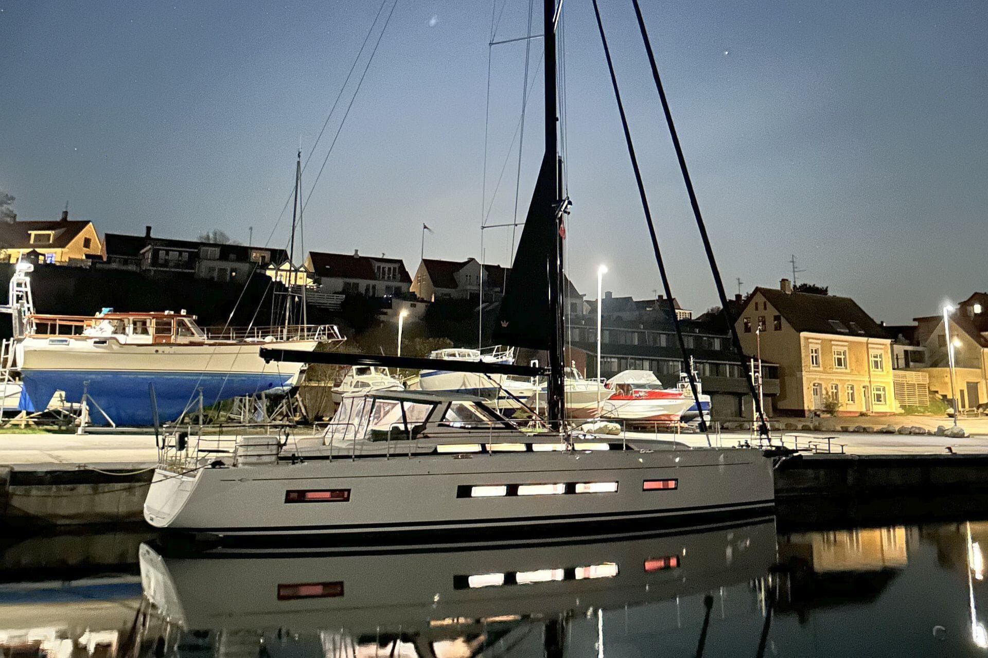 Amel 60 sailboat docked at night, 2023 model.