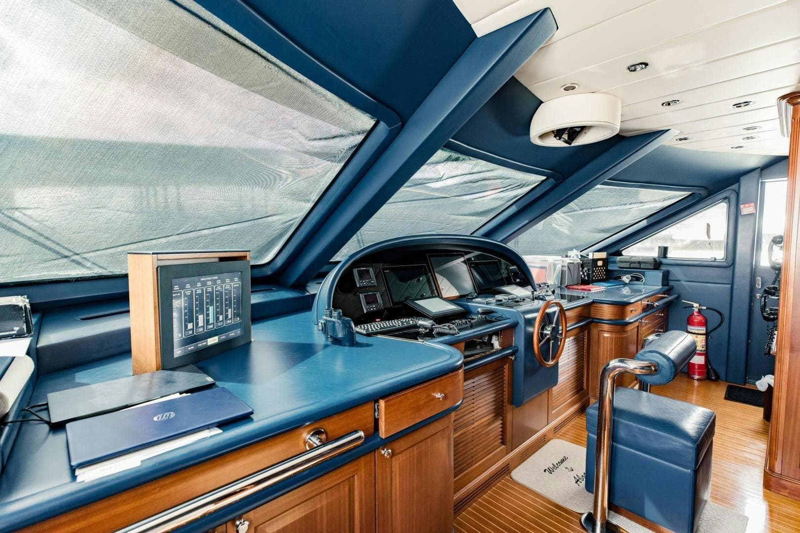 Luxurious helm of 2007 Benetti 120 Classic yacht with modern navigation equipment.