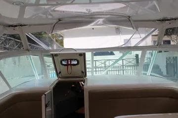 2008 Contender 38 Express boat interior with open hatch and seating area.