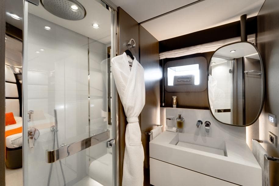 Luxurious bathroom in 2019 ISA Extra 130 yacht, featuring modern fixtures and elegant design.