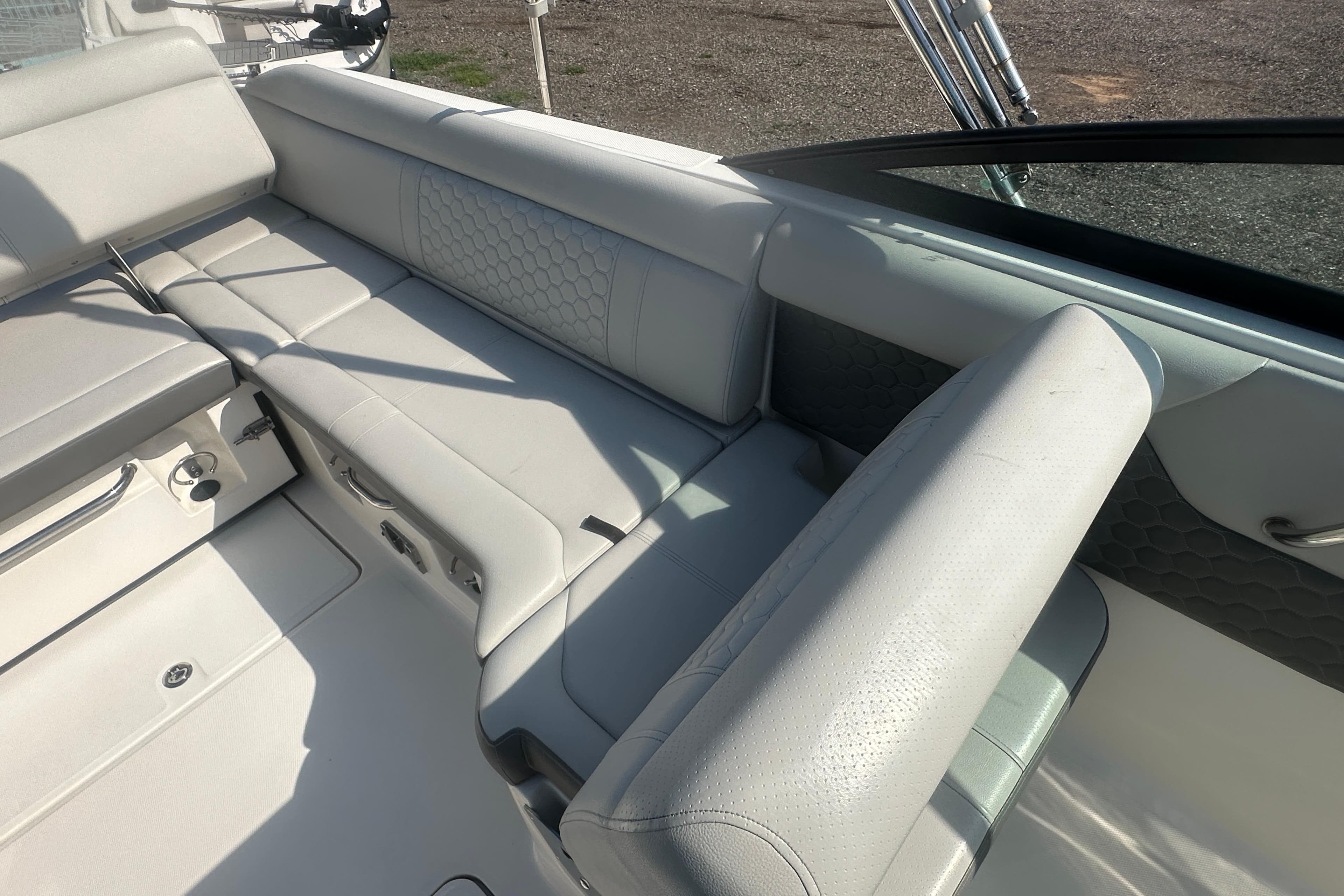 2023 Sea Ray SDX 250 Outboard interior with luxurious seating and modern design.