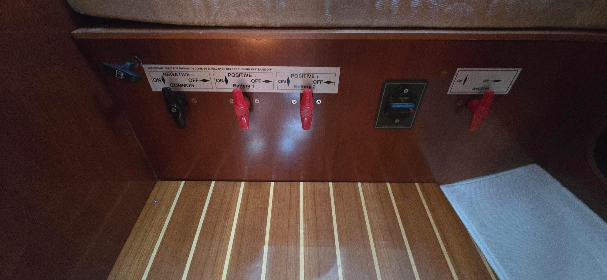 Control panel of a 2007 Beneteau 423 sailboat with battery switches.