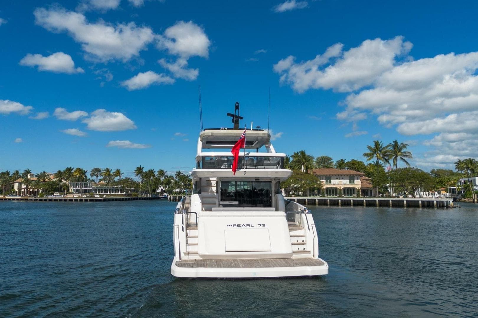 Luxury Pearl 72 yacht cruising on a sunny day, 2023 model.