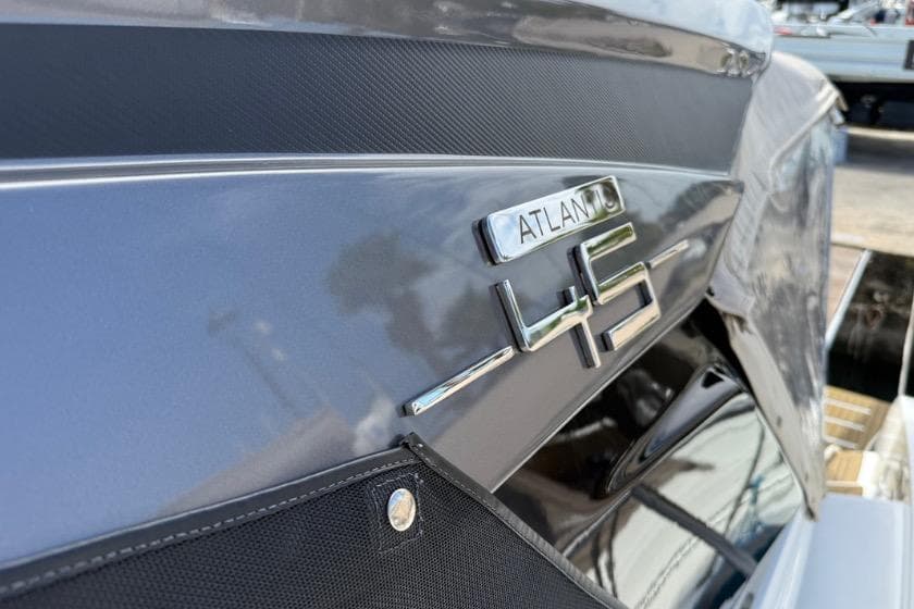 2023 Azimut Atlantis 45 yacht, close-up of model name on sleek exterior.