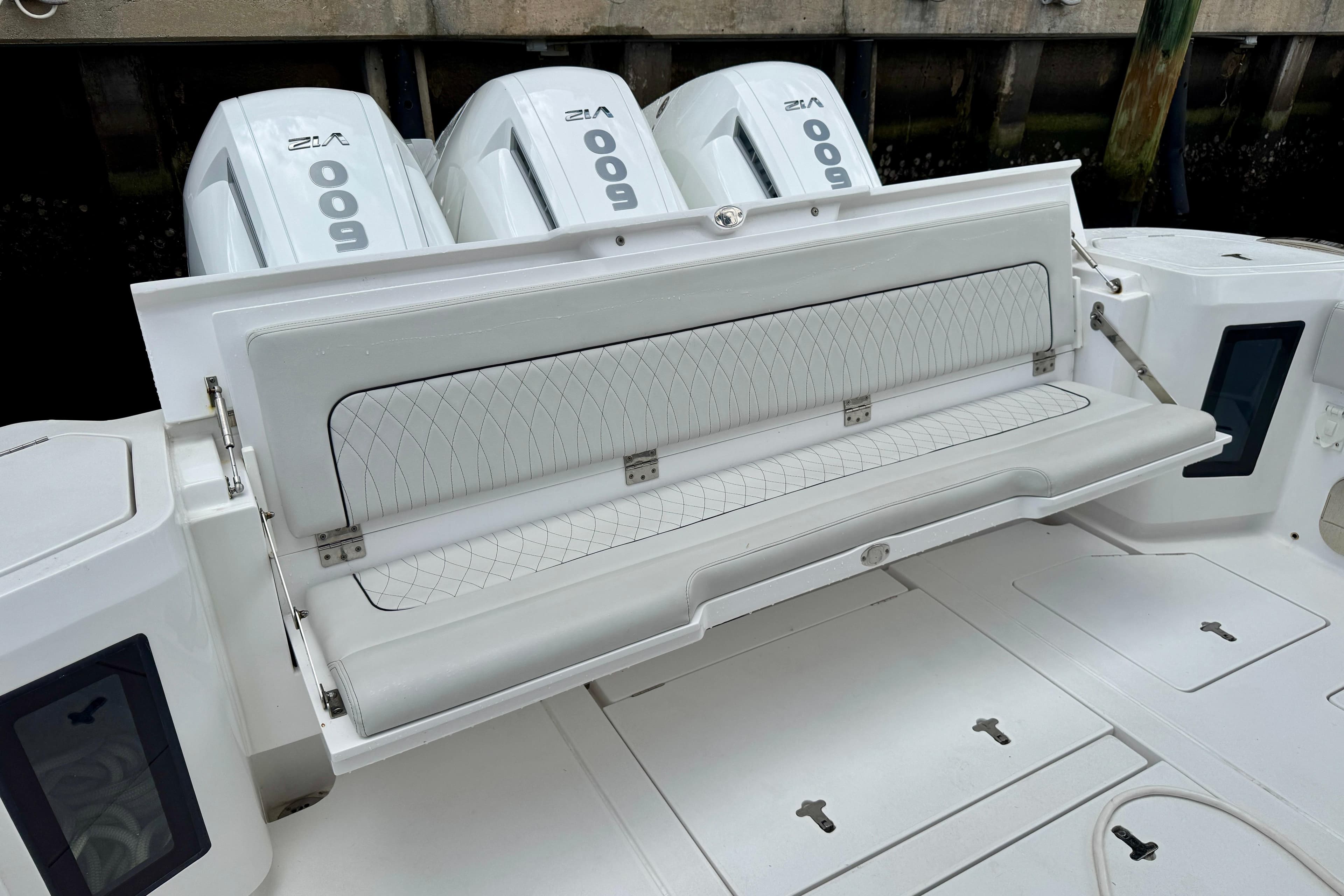 2024 Intrepid 427 Nomad SE boat with foldable seating and powerful engines.