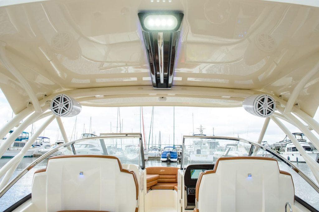 Manufacturer Provided Image: 2023 Scout 255 Dorado boat interior with marina view.