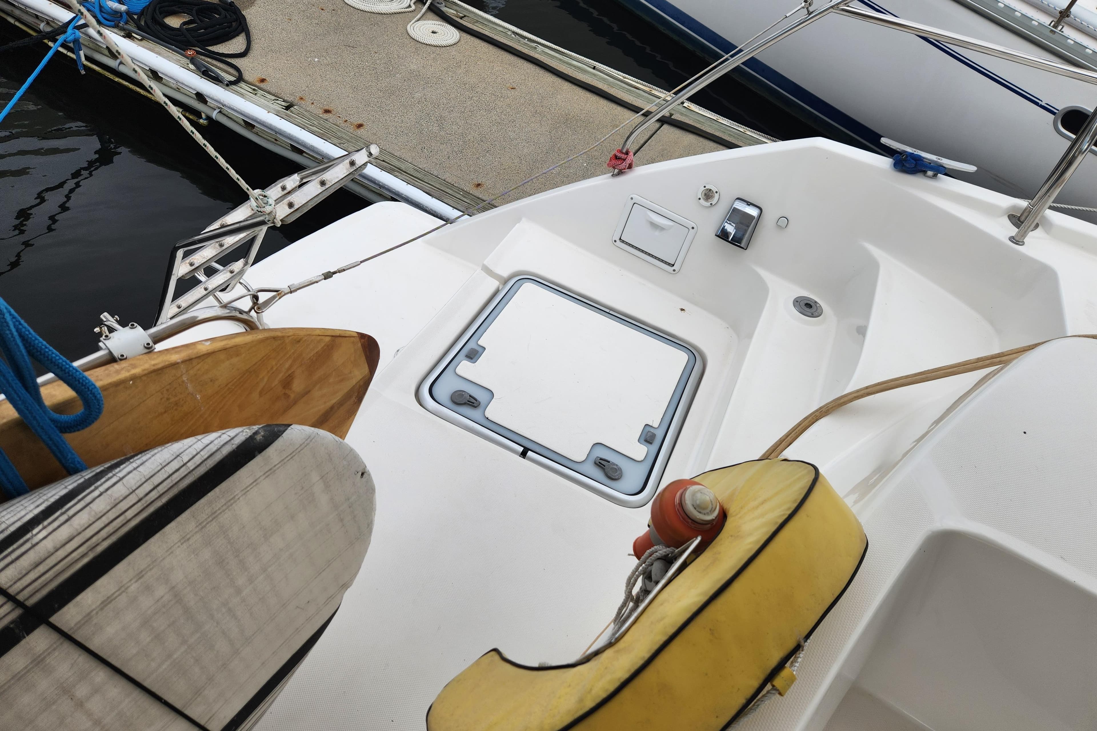 2015 Leopard 44 yacht deck with storage hatch and safety equipment.