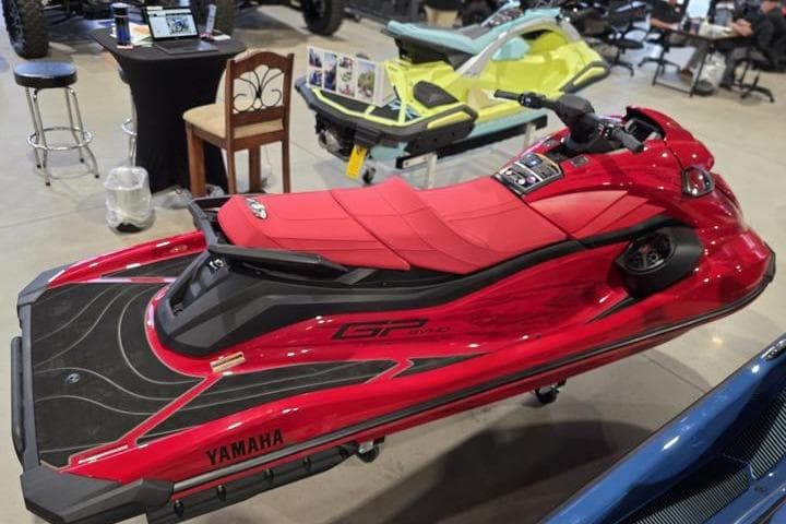 2026 Yamaha WaveRunner GP SVHO in vibrant red on display indoors.