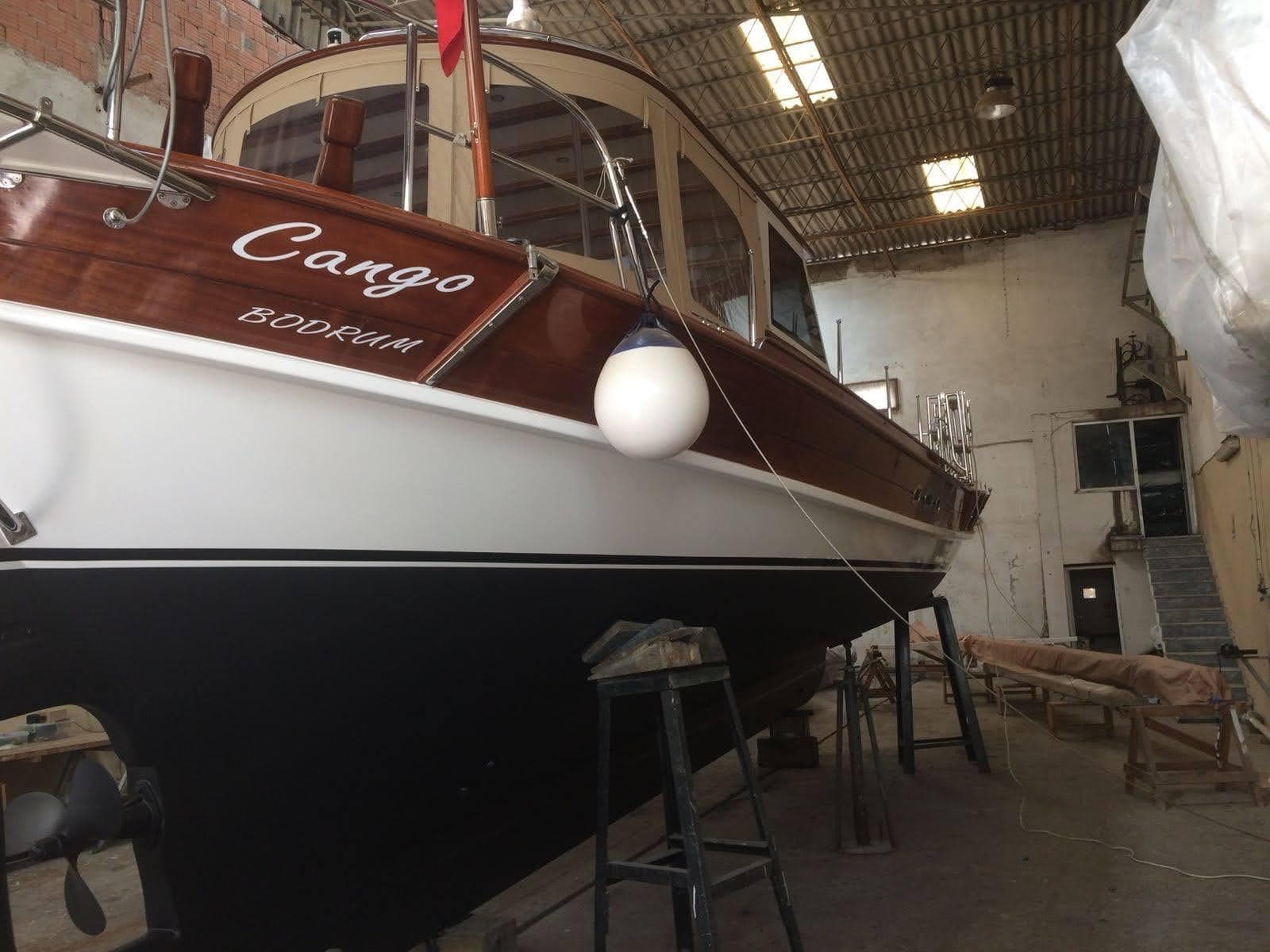 Bodrum Tirhandil 14m boat in a workshop, 2001 model, named "Cango".