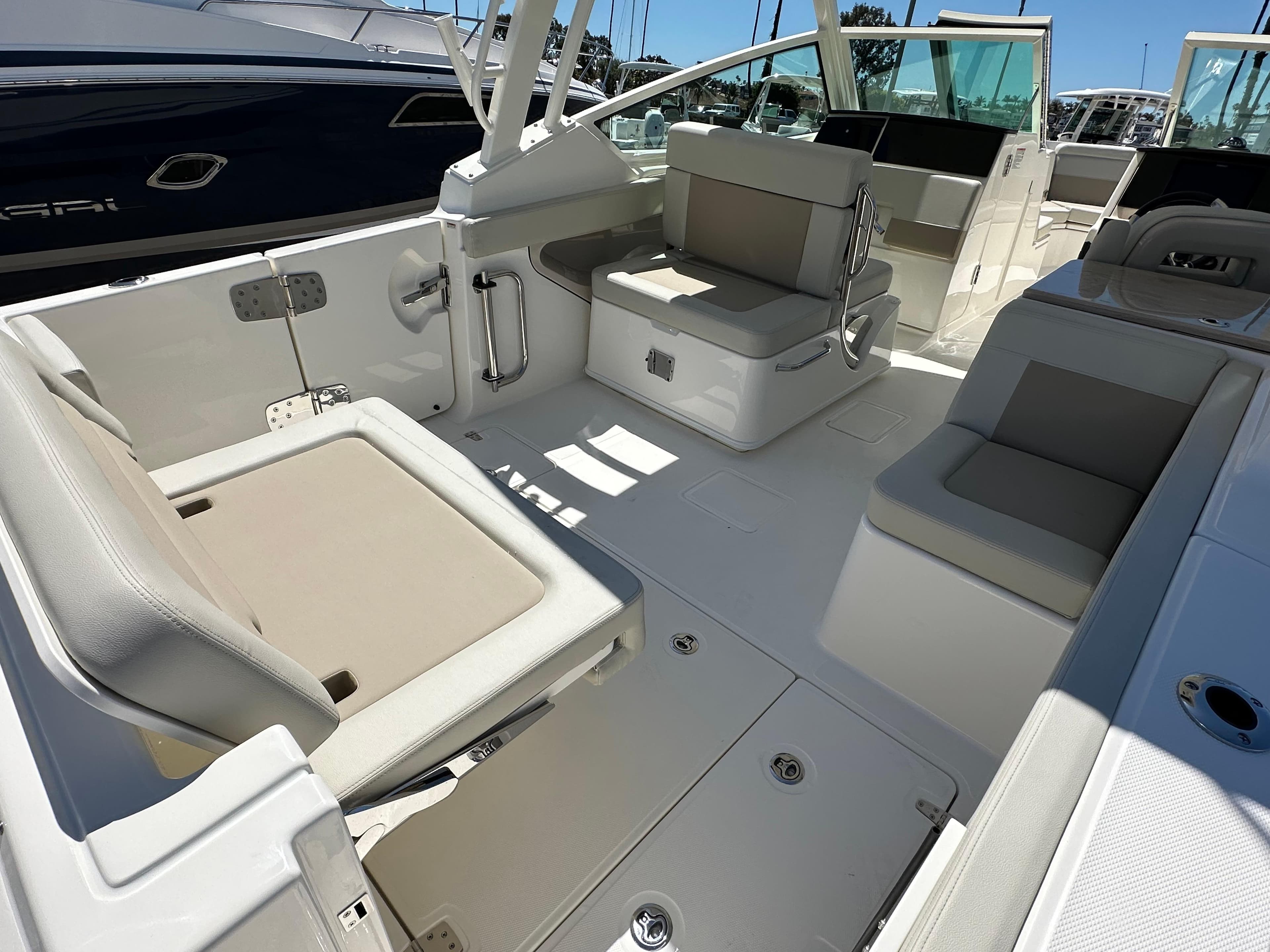 2024 Boston Whaler 280 Vantage boat interior with seating and storage compartments.