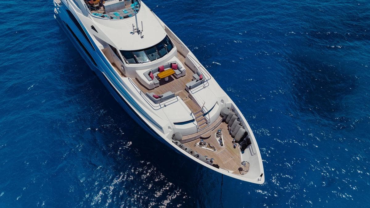 Luxurious 2012 Sunseeker 131 Yacht cruising on clear blue ocean waters.