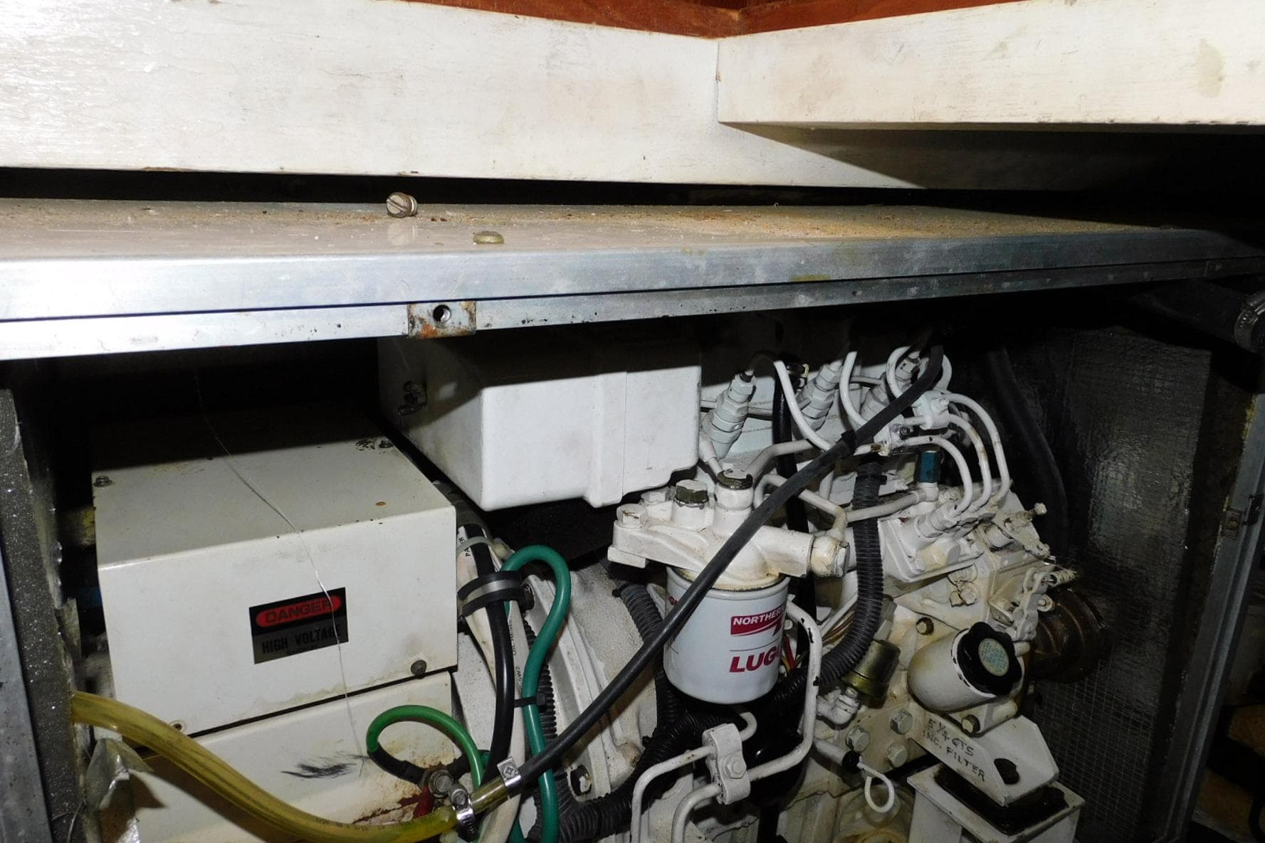 Engine compartment of 1988 Hans Christian 45 Independence Trawler, showcasing mechanical components.