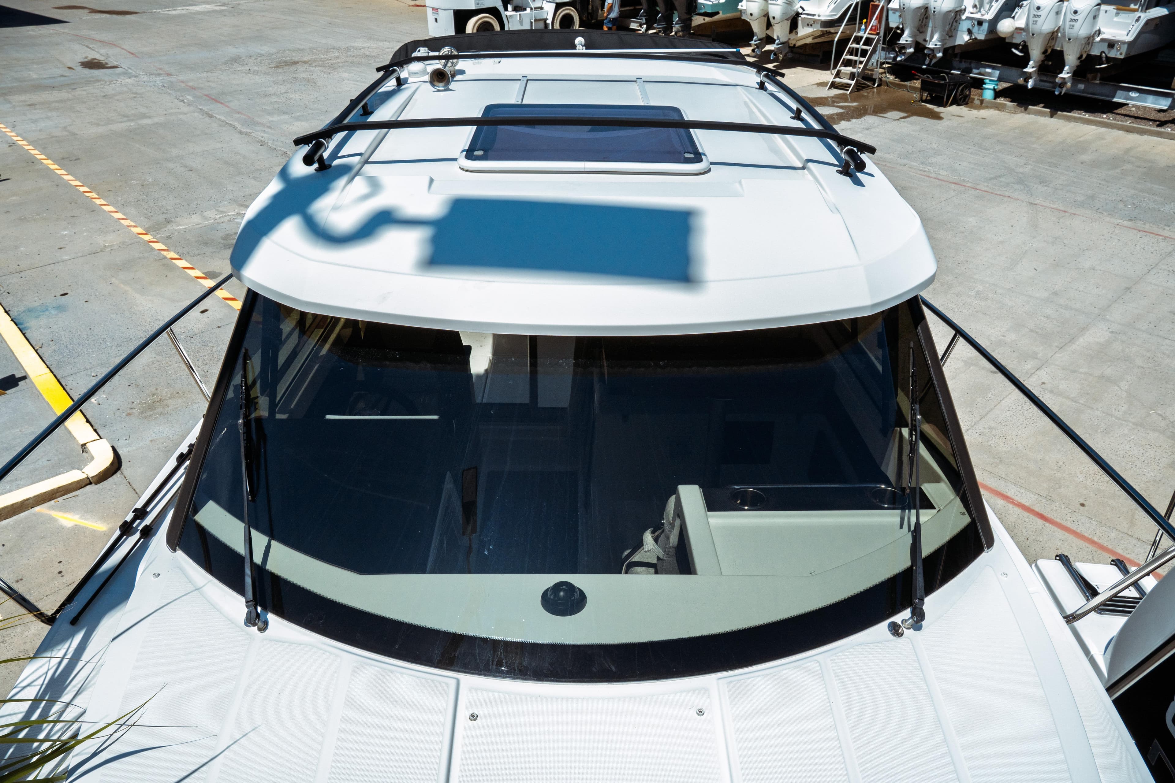 2023 Jeanneau NC Weekender 795 Series 2 boat, top view at marina.