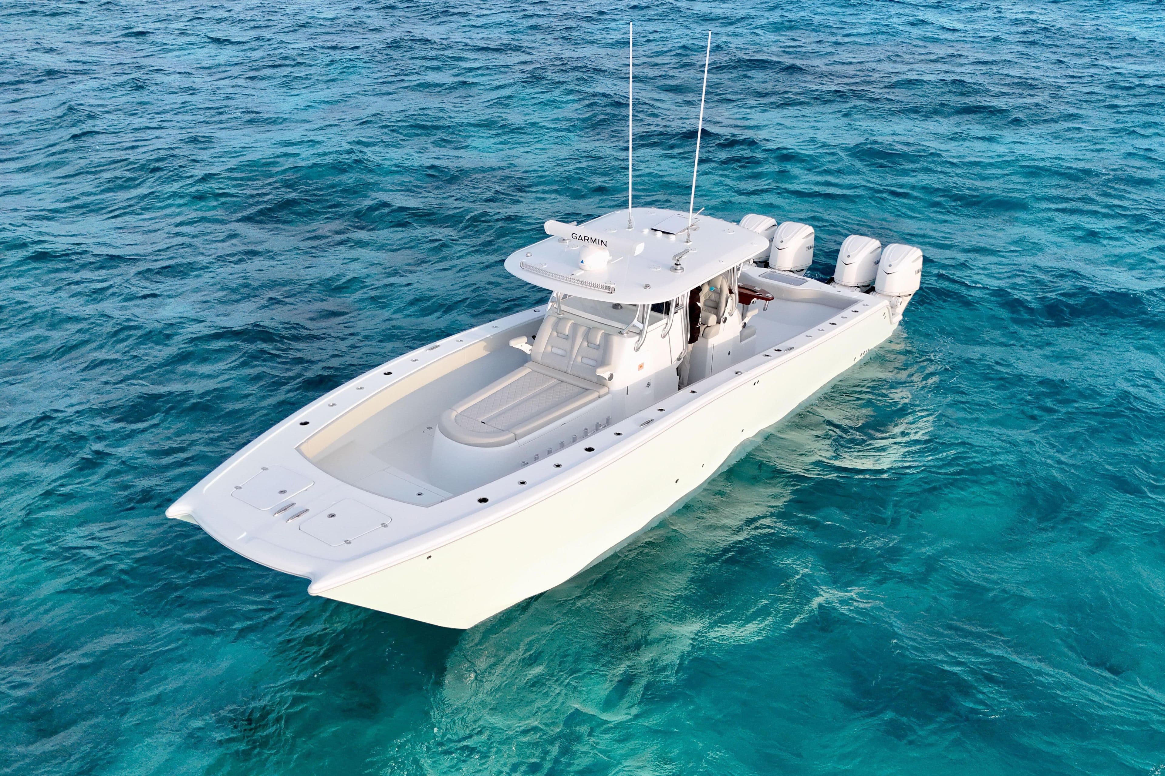 2024 Freeman 37 boat cruising on clear blue ocean waters.