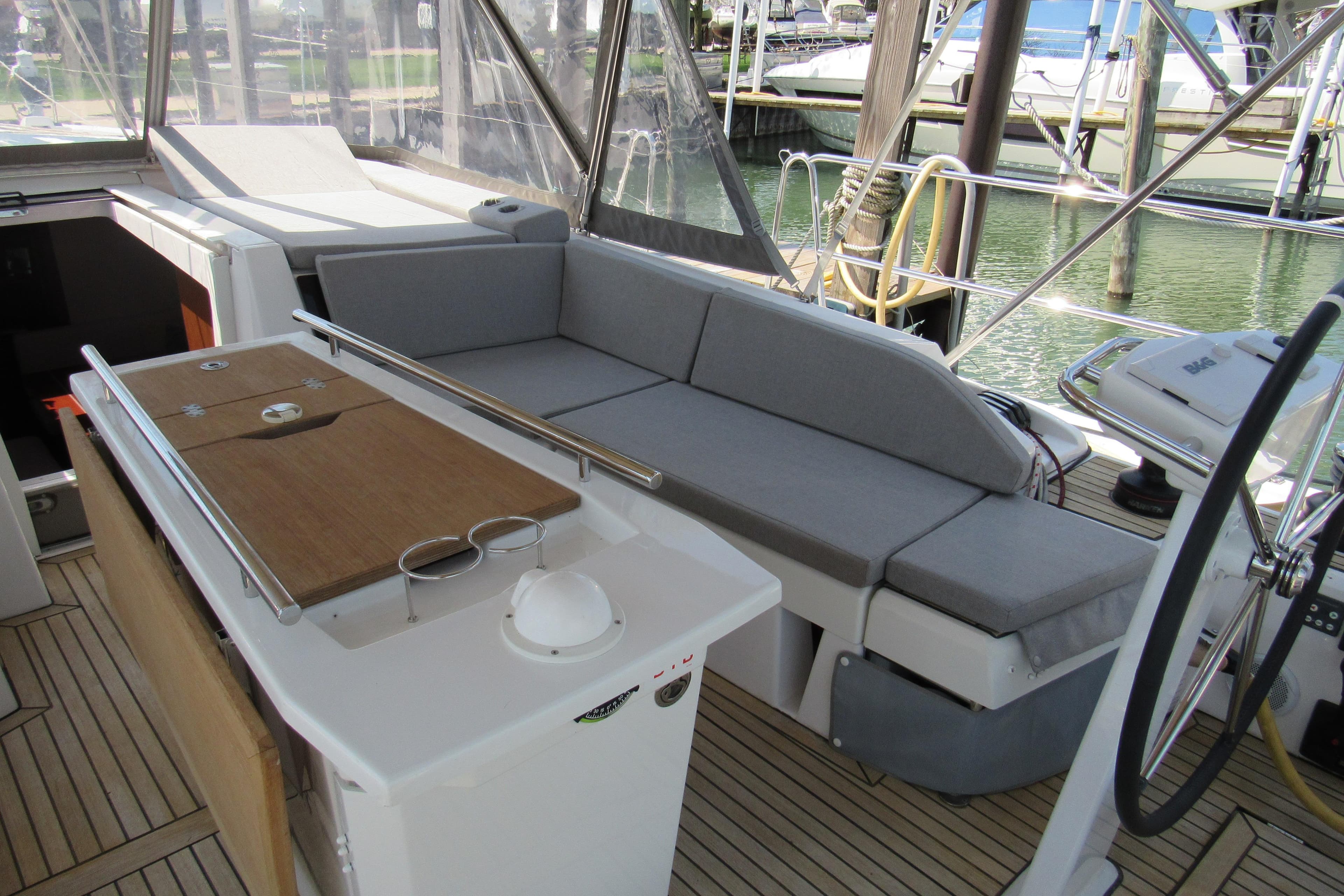 2020 Beneteau Oceanis 46.1 yacht cockpit with seating and steering wheel.