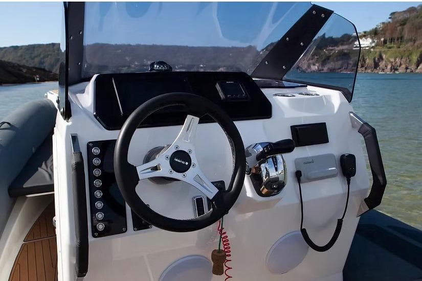 Manufacturer Provided Image: Cockpit of 2026 Brig Eagle 8 boat with steering wheel and controls.