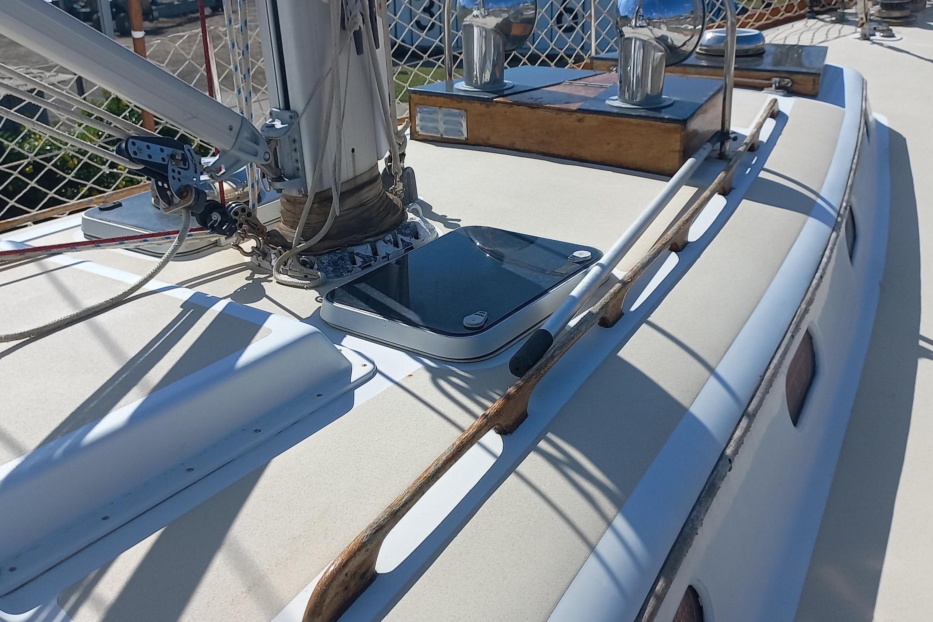 1974 Hinckley 49 sailboat deck with rigging and winches in sunlight.