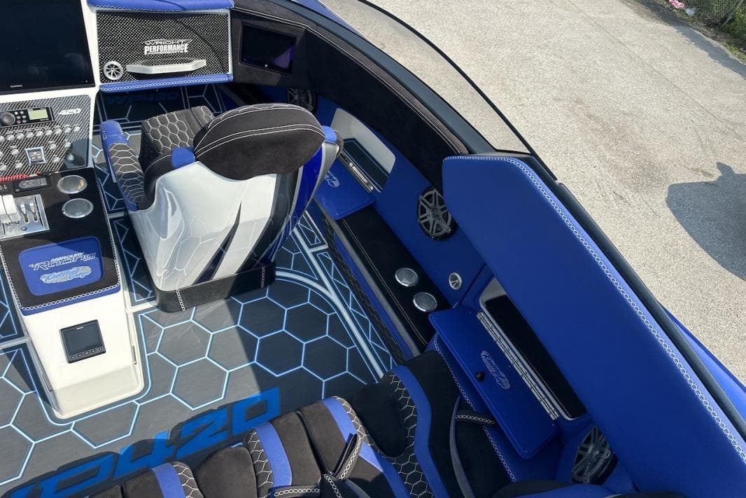 Interior of 2018 Wright Performance 420 boat with blue accents and modern controls.
