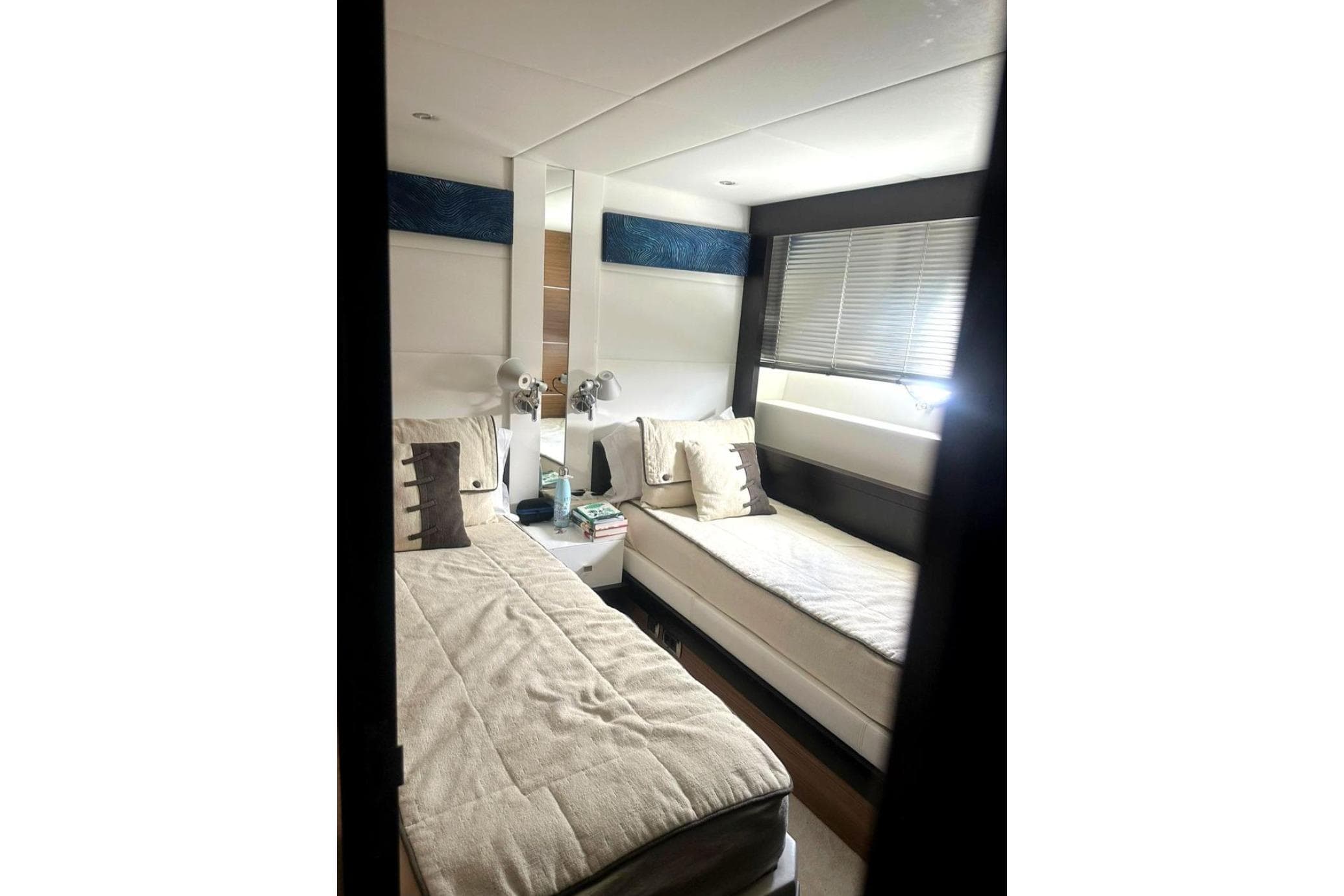 Interior of 2008 Astondoa 76 GLX yacht with twin beds and modern decor.