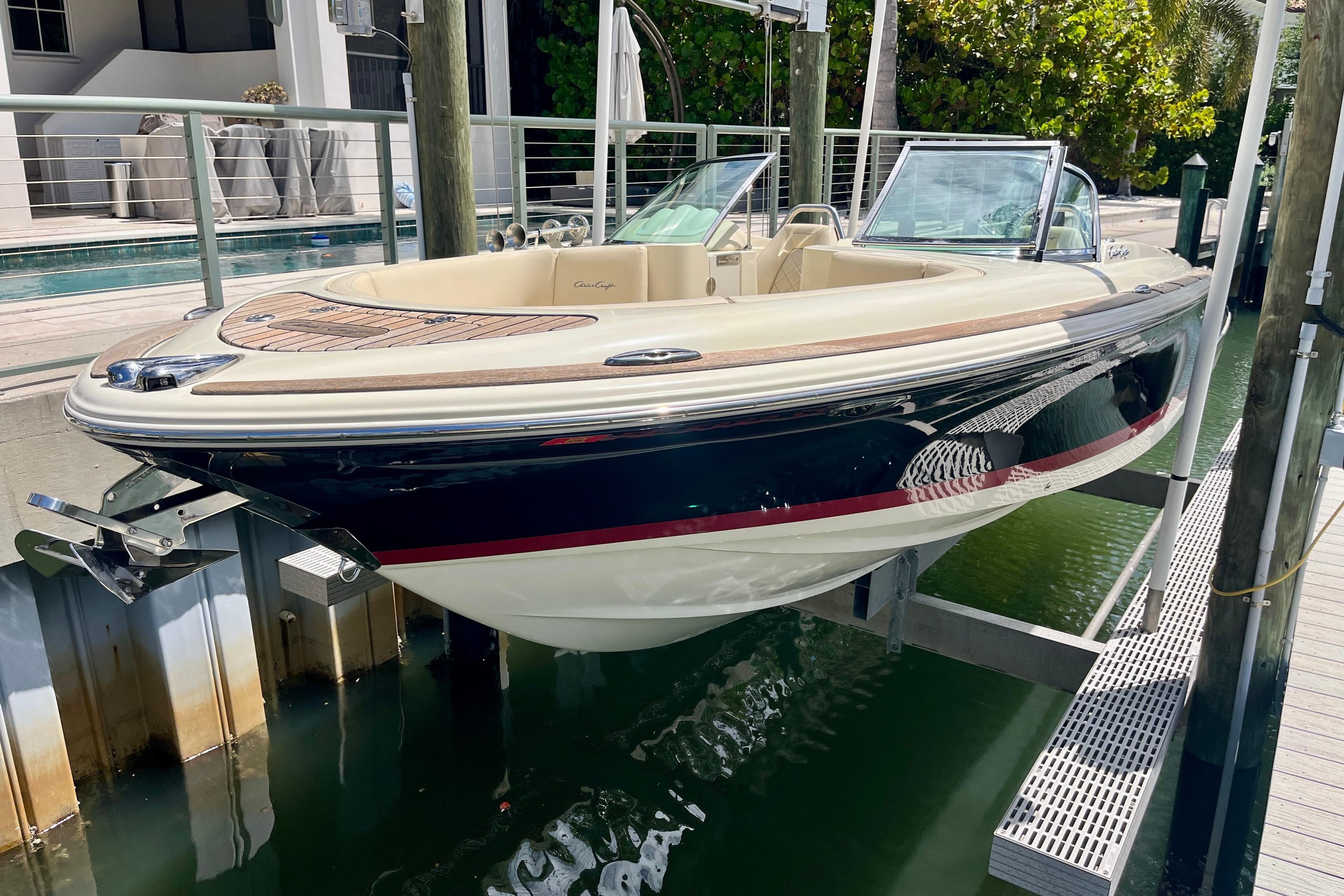 2019 Chris-Craft Launch 27 boat docked, showcasing sleek design and luxury features.