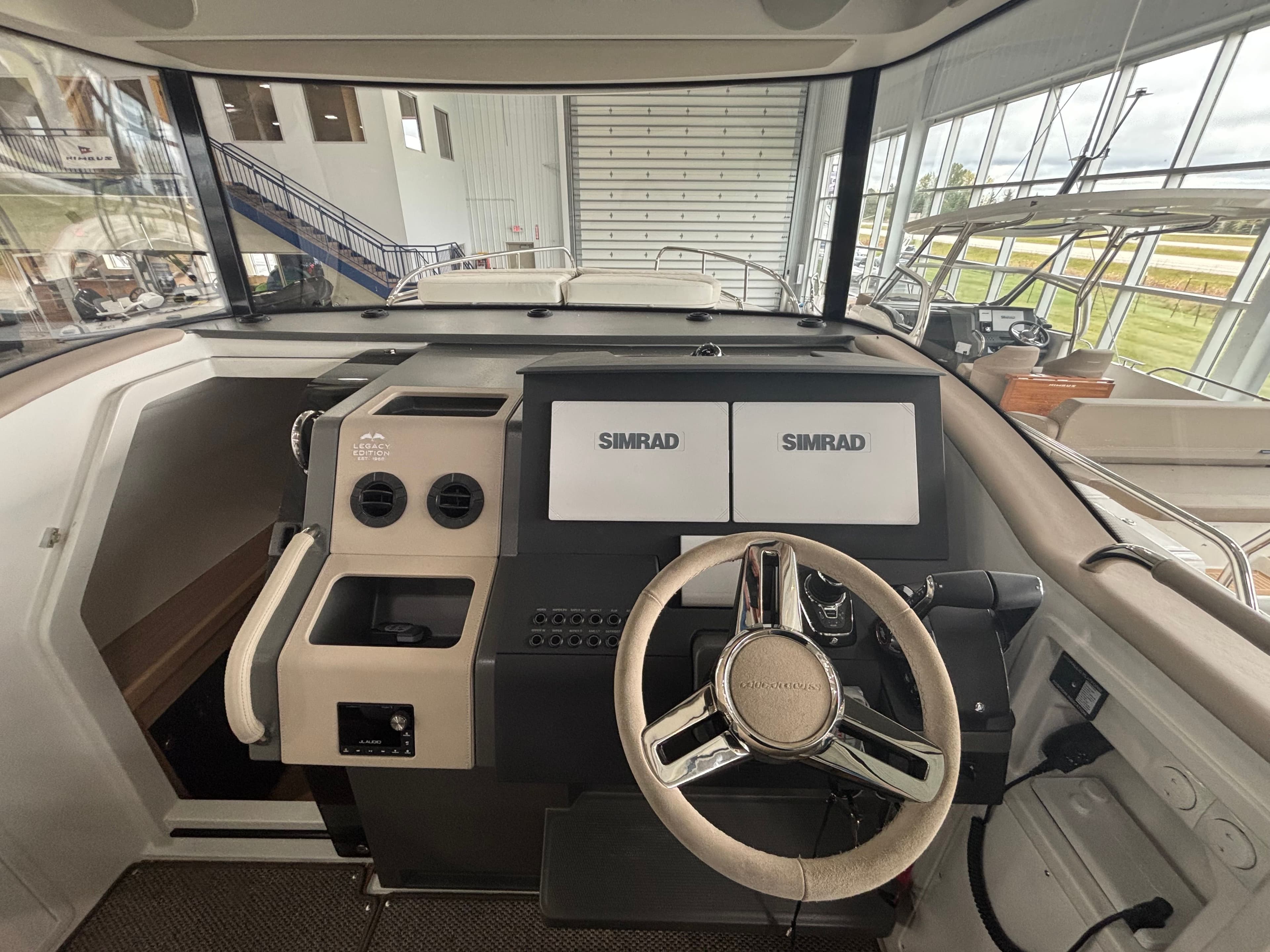 Interior cockpit of 2026 Nimbus Commuter 11 MKII Legacy Edition with dual Simrad displays.