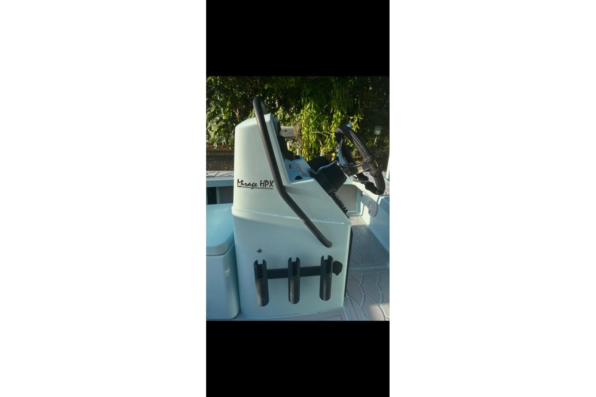 2019 Maverick 18 HPX-V boat console with steering wheel and rod holders.