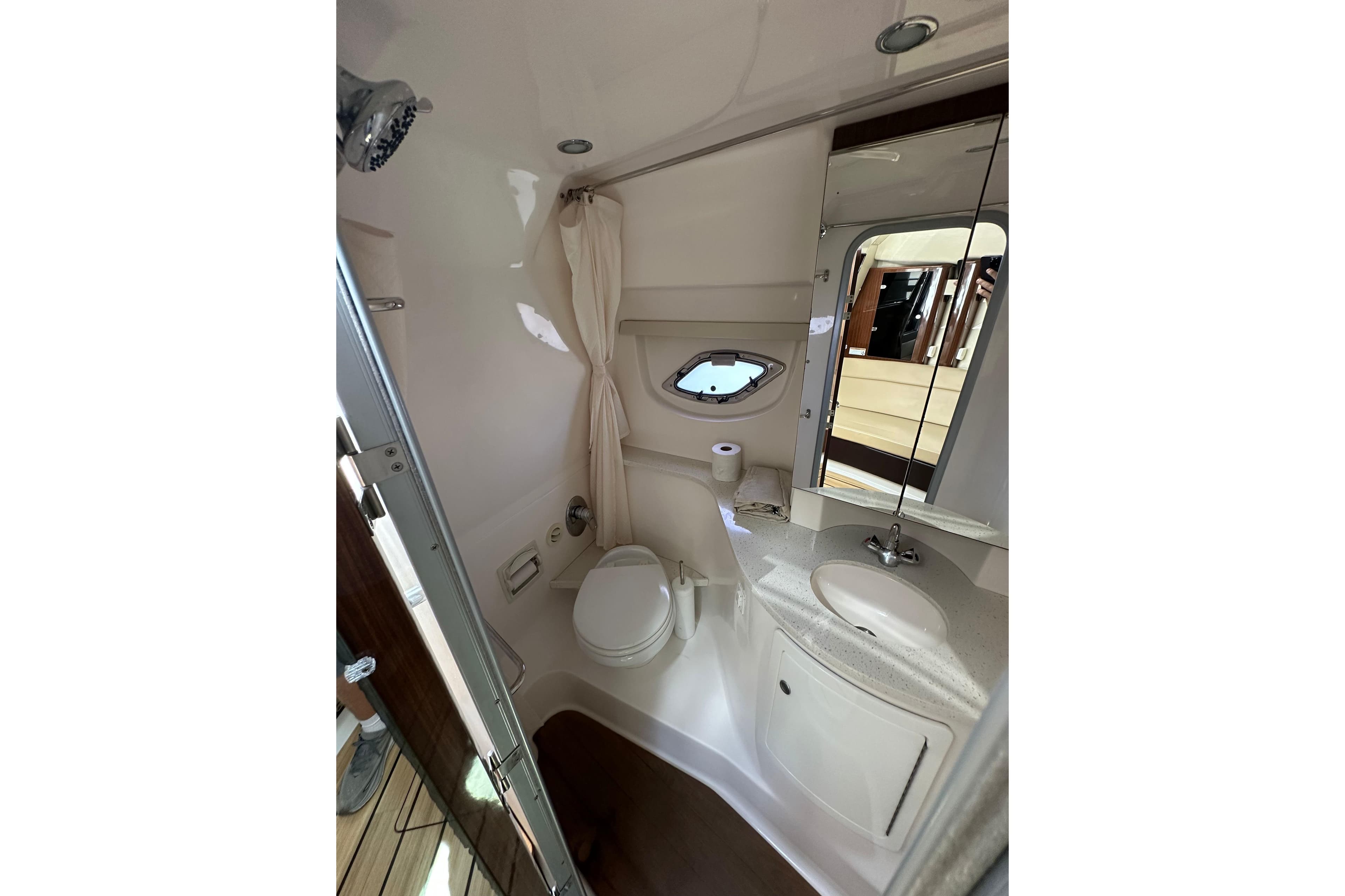 2014 Regal 35 Sport Coupe bathroom with modern fixtures and compact design.