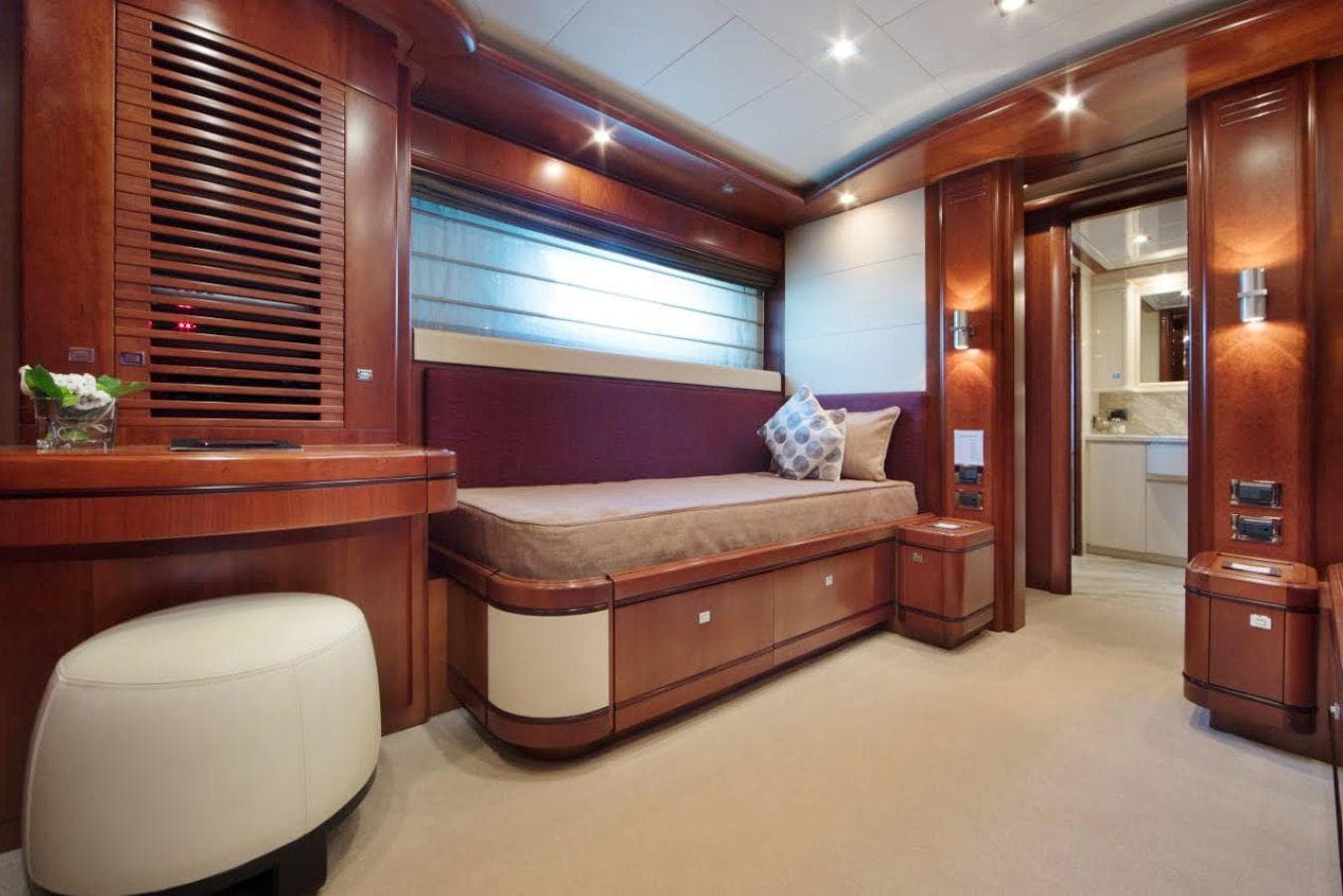Luxurious CRN 128 yacht interior, featuring elegant wood finishes and modern design, 2007 model.