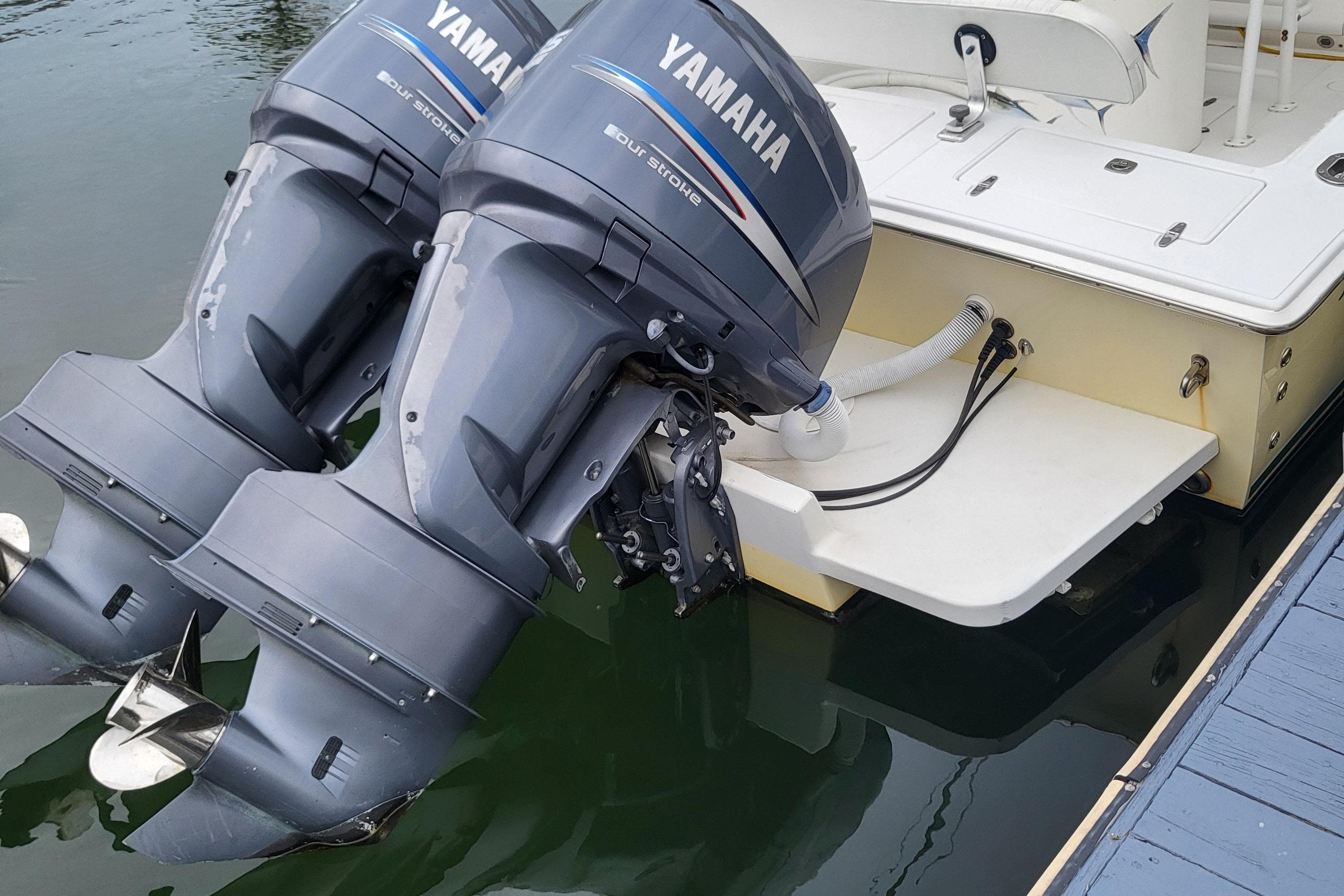Yamaha outboard motors on a 2004 Jupiter 31 Center Console boat.