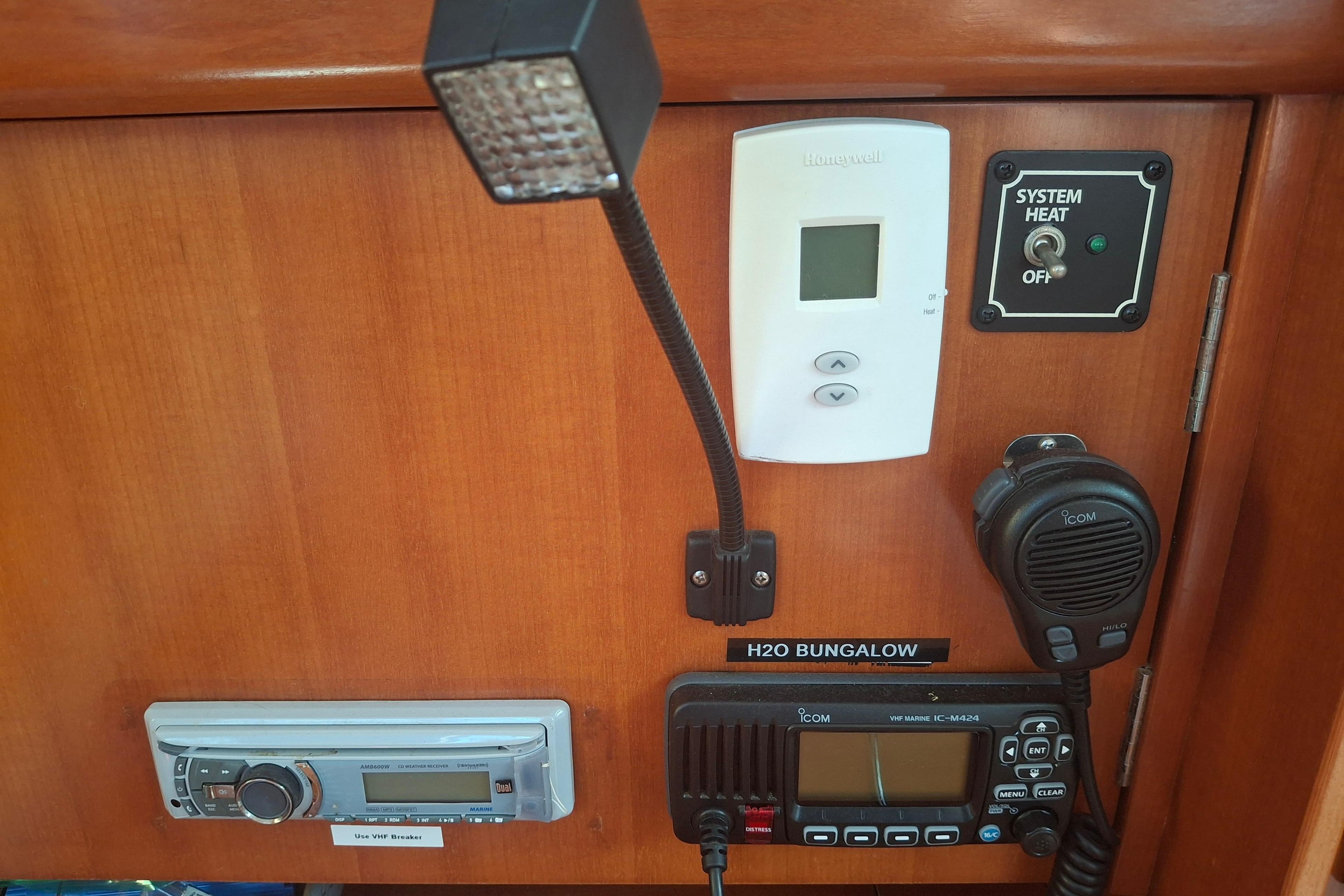 Control panel of a 2006 Beneteau Oceanis 393 yacht with communication and heating systems.