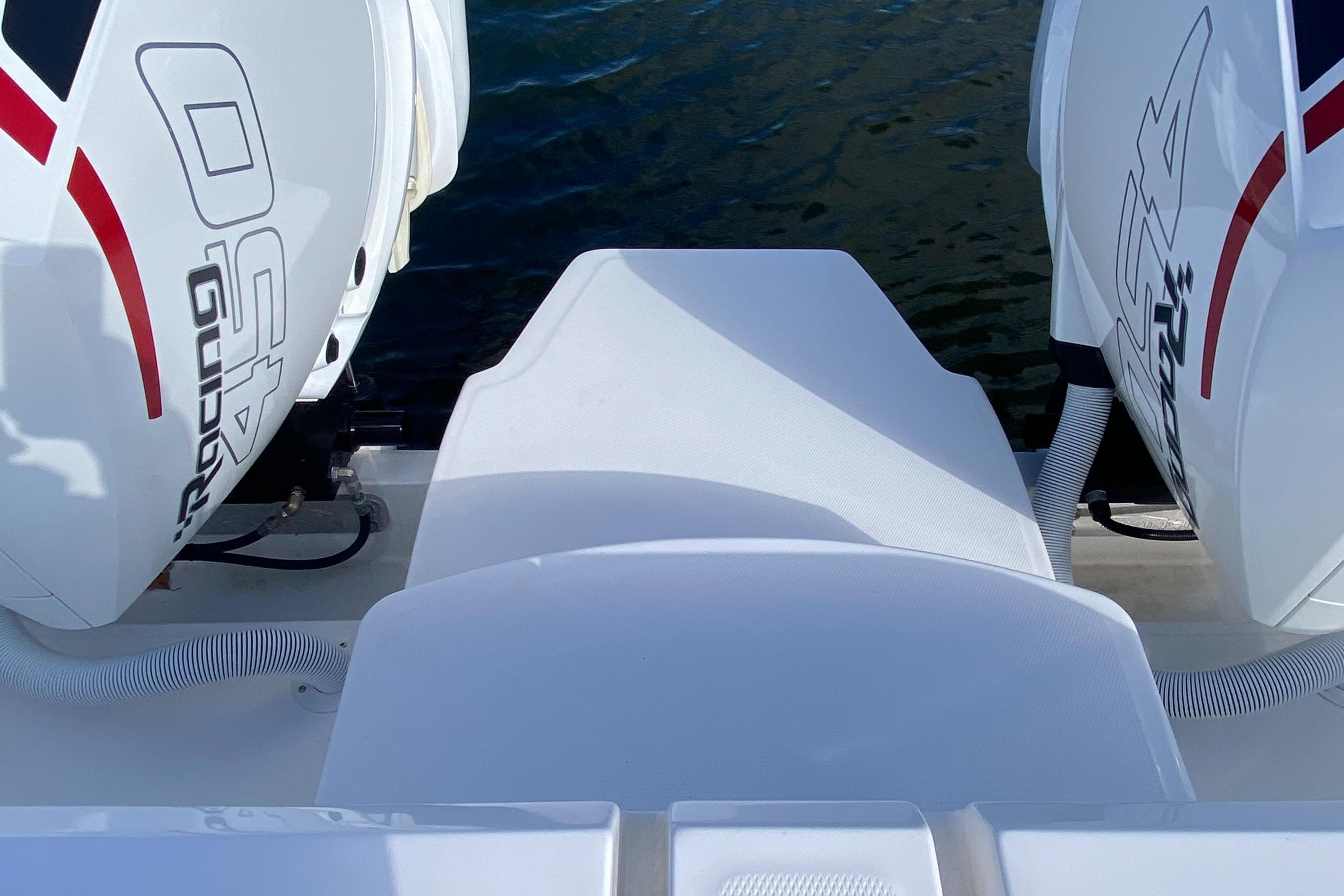 2023 Invincible 46 Catamaran Plus with dual outboard engines on water.