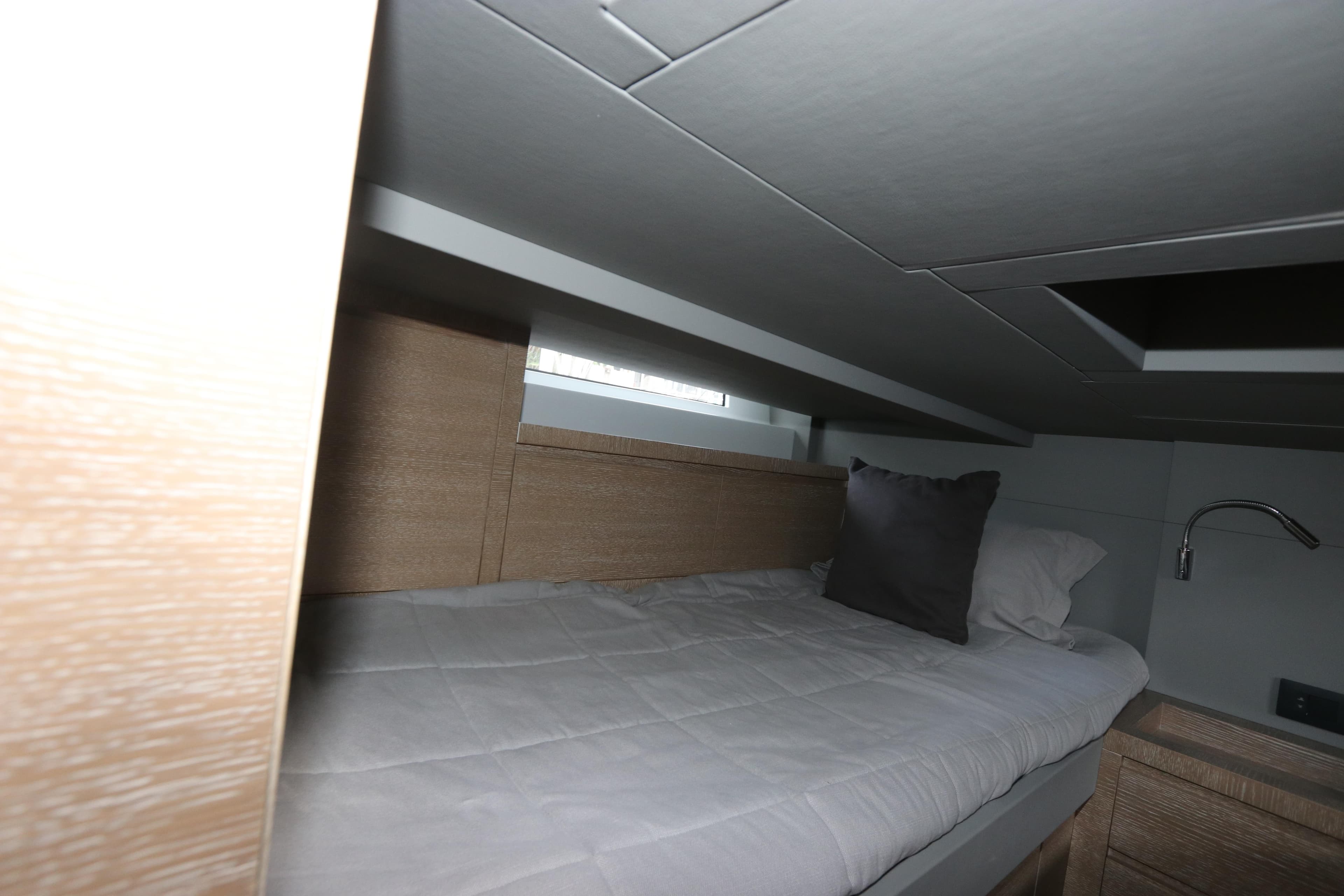 2024 Astondoa 377 Coupe Outboard cabin interior with bed and modern design.