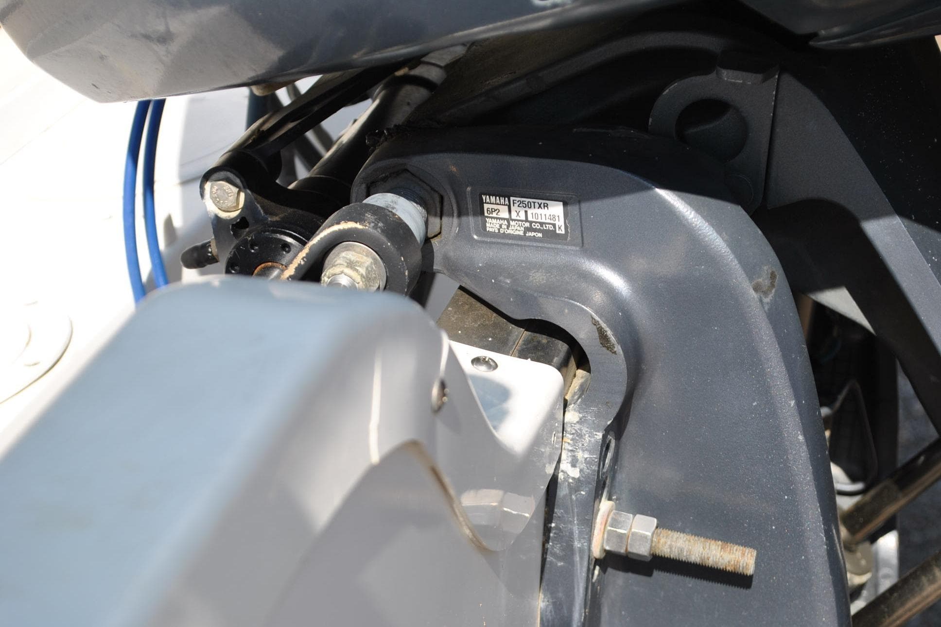 Close-up of a Yamaha F250TXR engine part on a 1993 Robalo 2120 Center Console boat.