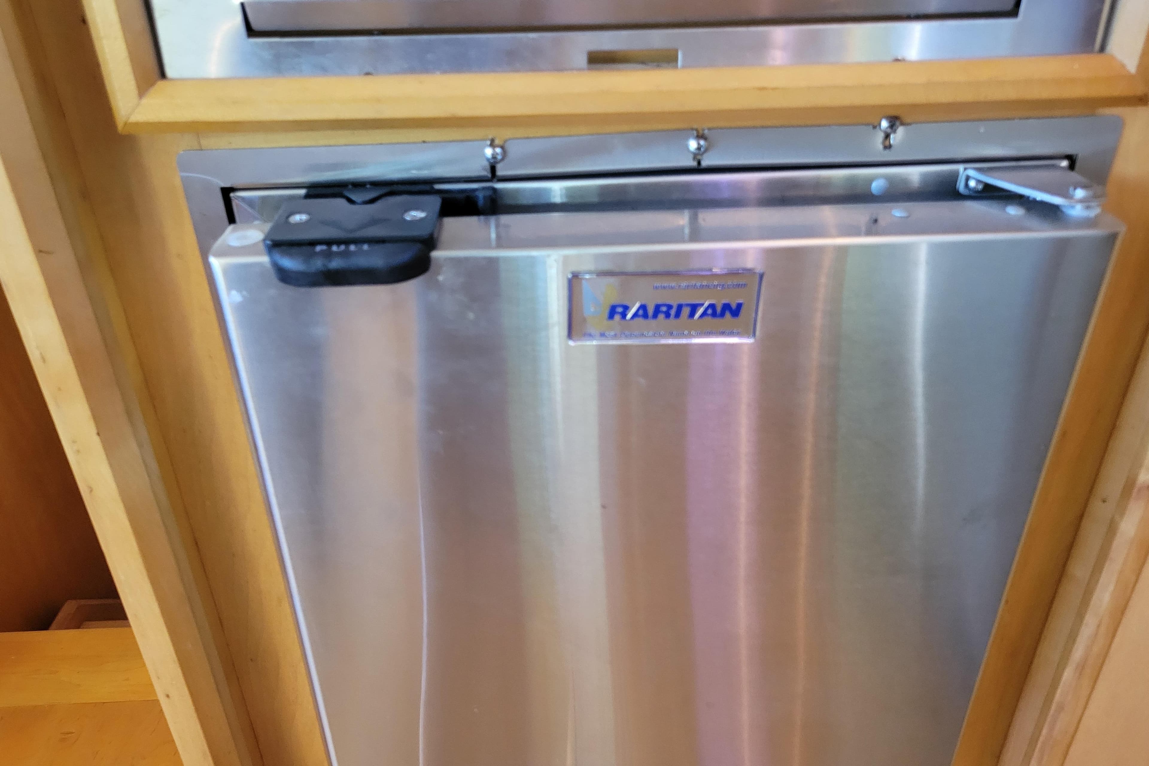 Stainless steel Raritan appliance on 1979 Bertram 38 Convertible yacht.