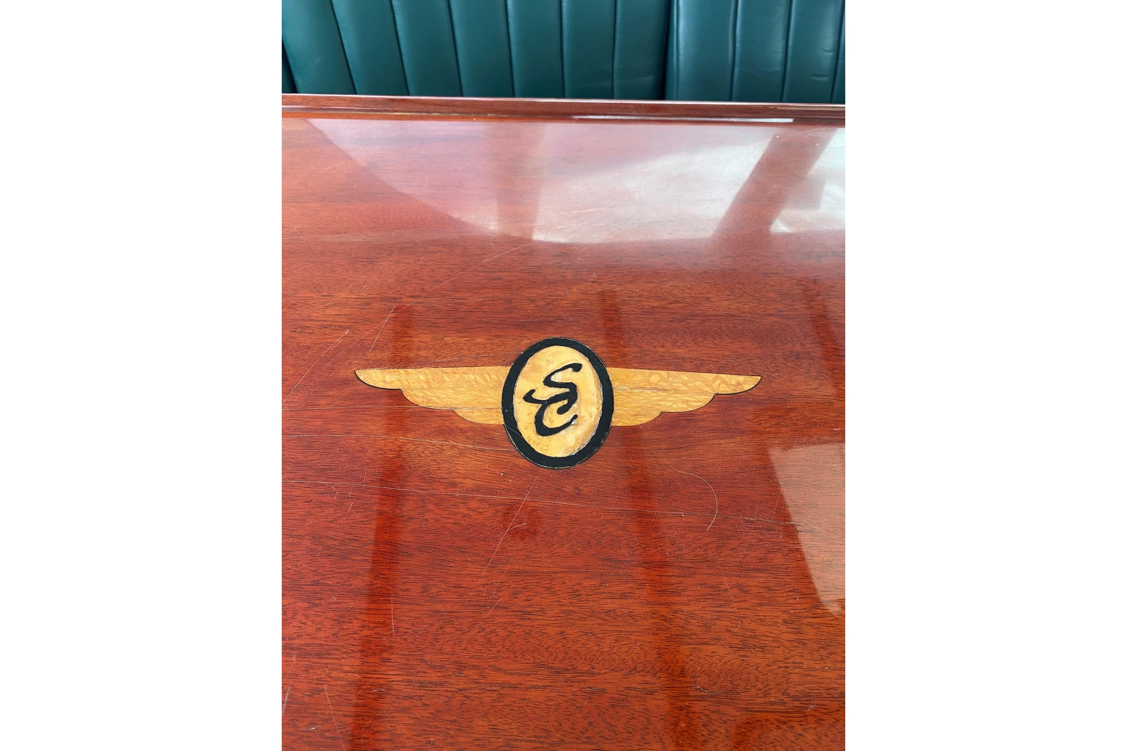 Mahogany Table with Santa Cruz Coastal Flyer engraved on bridge.