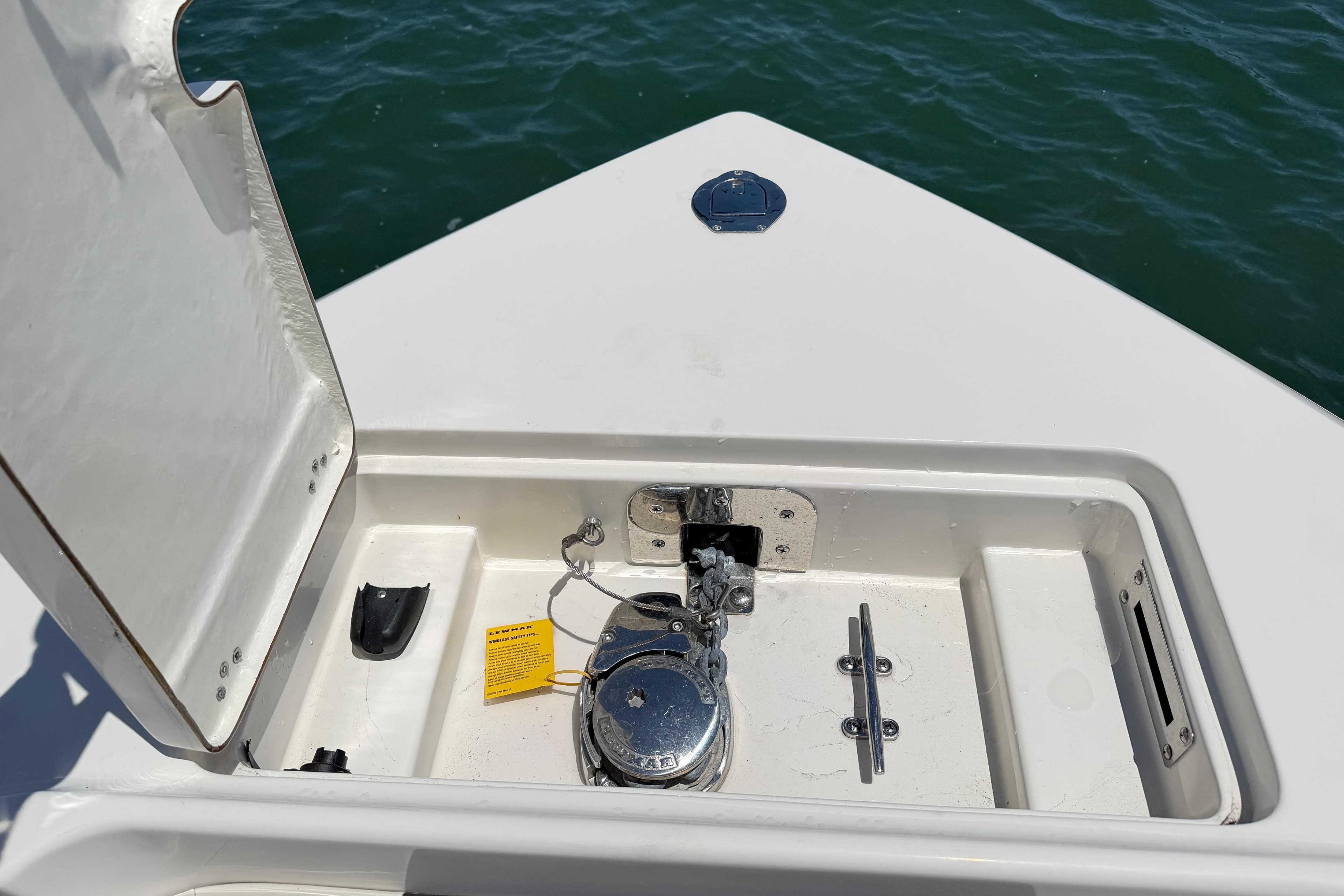 Anchor compartment of 2021 Sailfish 290 CC boat with open hatch.