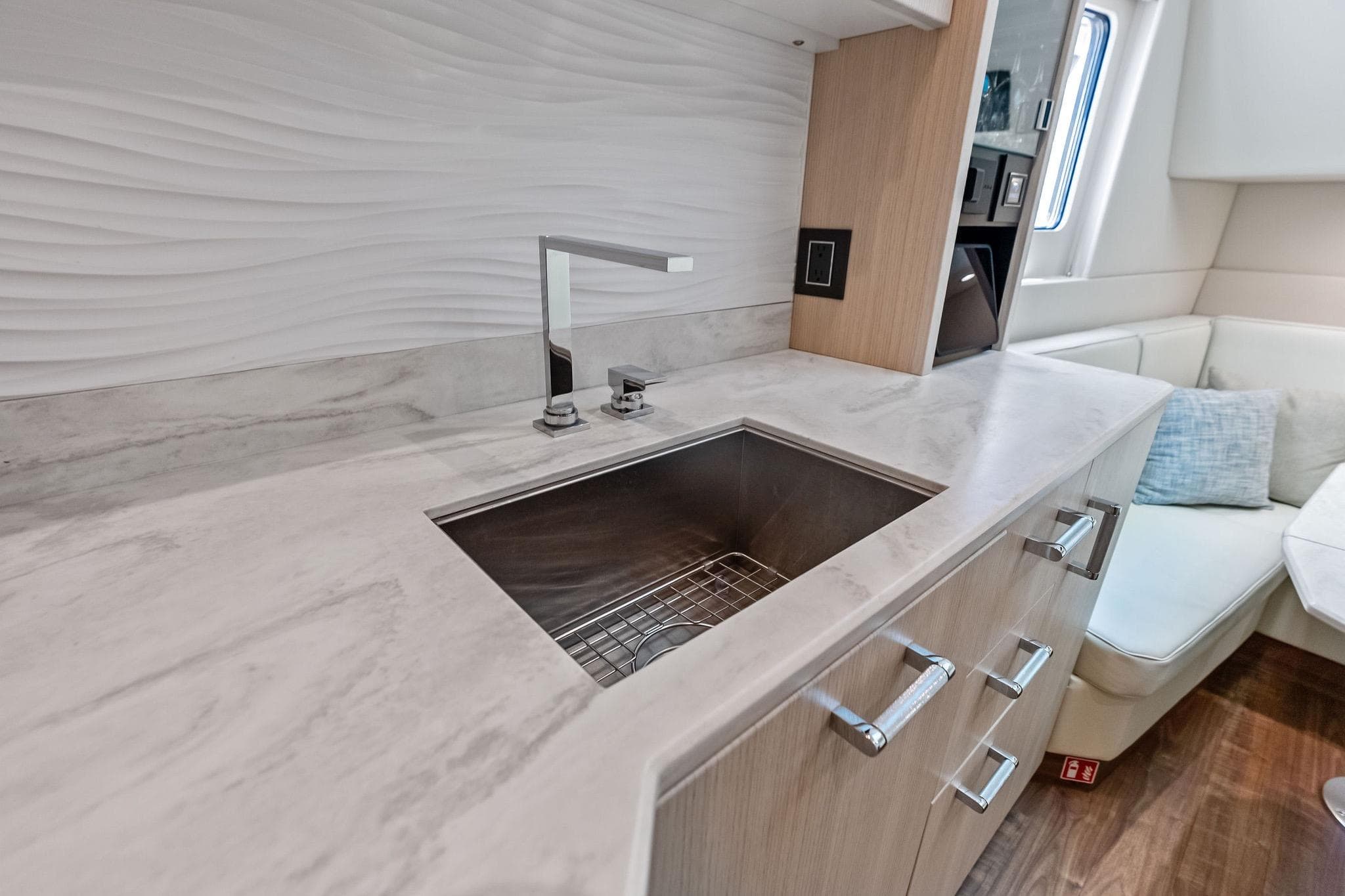 Modern kitchen interior of 2025 Formula 500 Super Sport Crossover yacht, featuring sleek design and amenities.