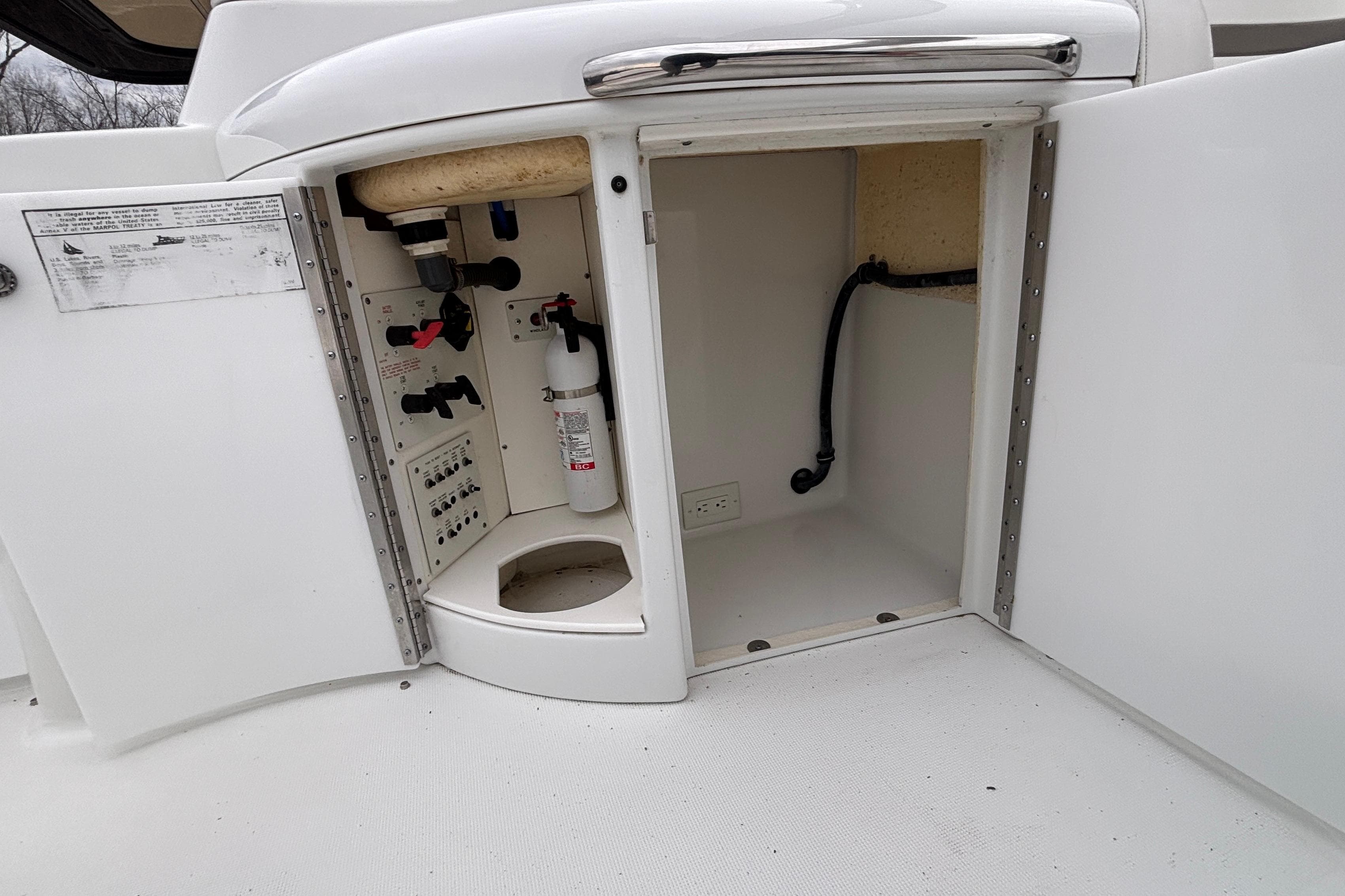 Open storage compartment on 2005 Formula 31 Performance Cruiser boat.