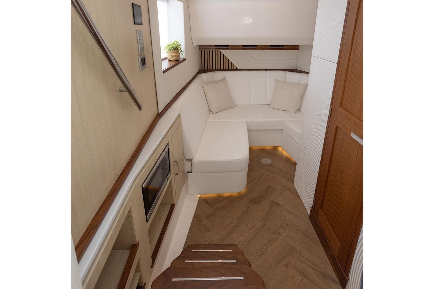 Manufacturer Provided Image: Luxurious interior of 2026 Regal 43 SAV yacht with elegant seating and modern design.