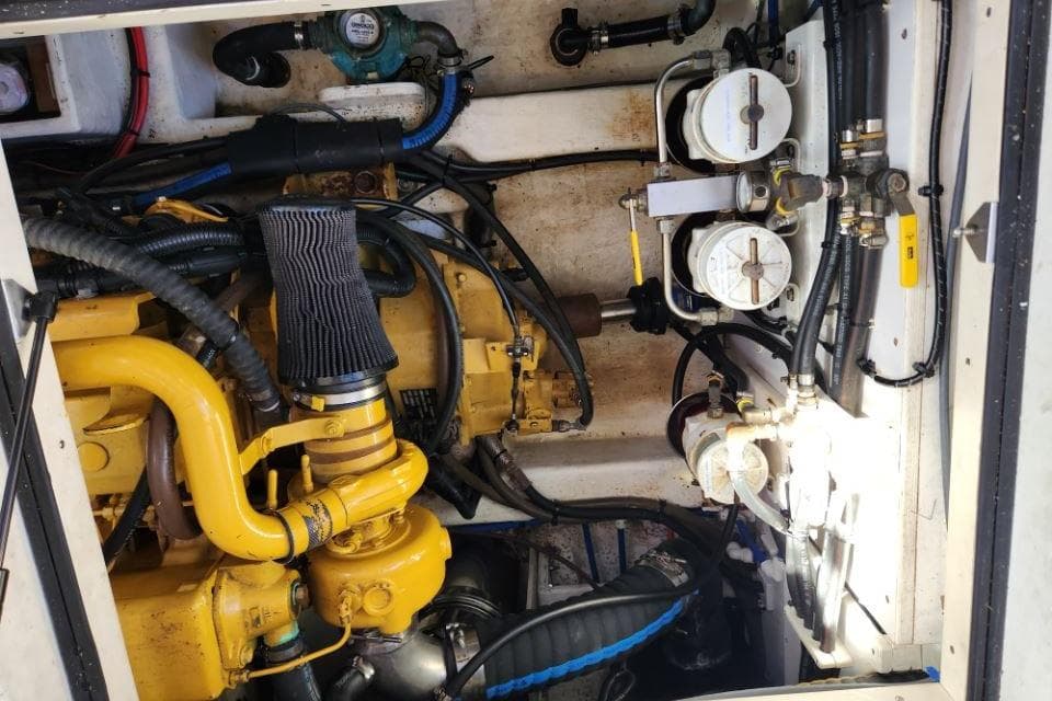Engine compartment of a 2008 Bruckmann 50 MKII yacht, showcasing mechanical components.