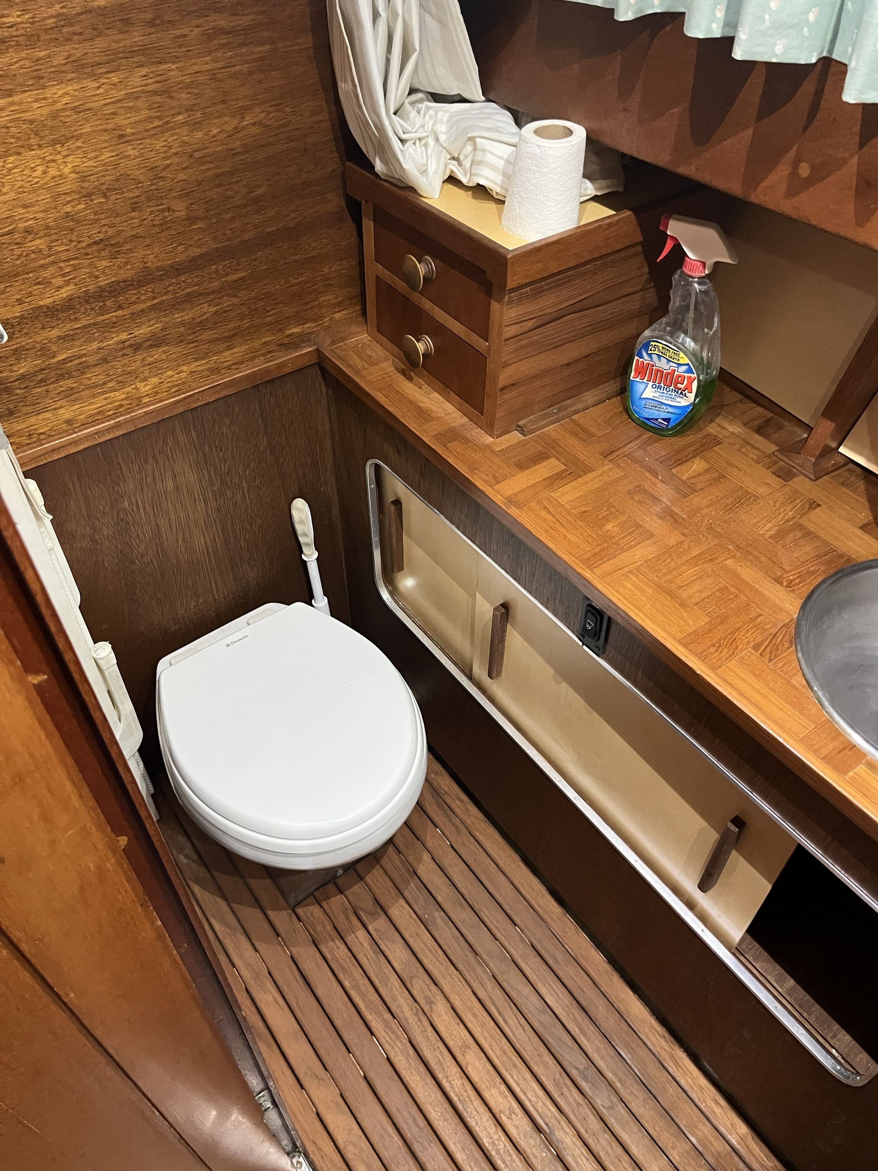1959 Owens Cabin bathroom with wooden interior.