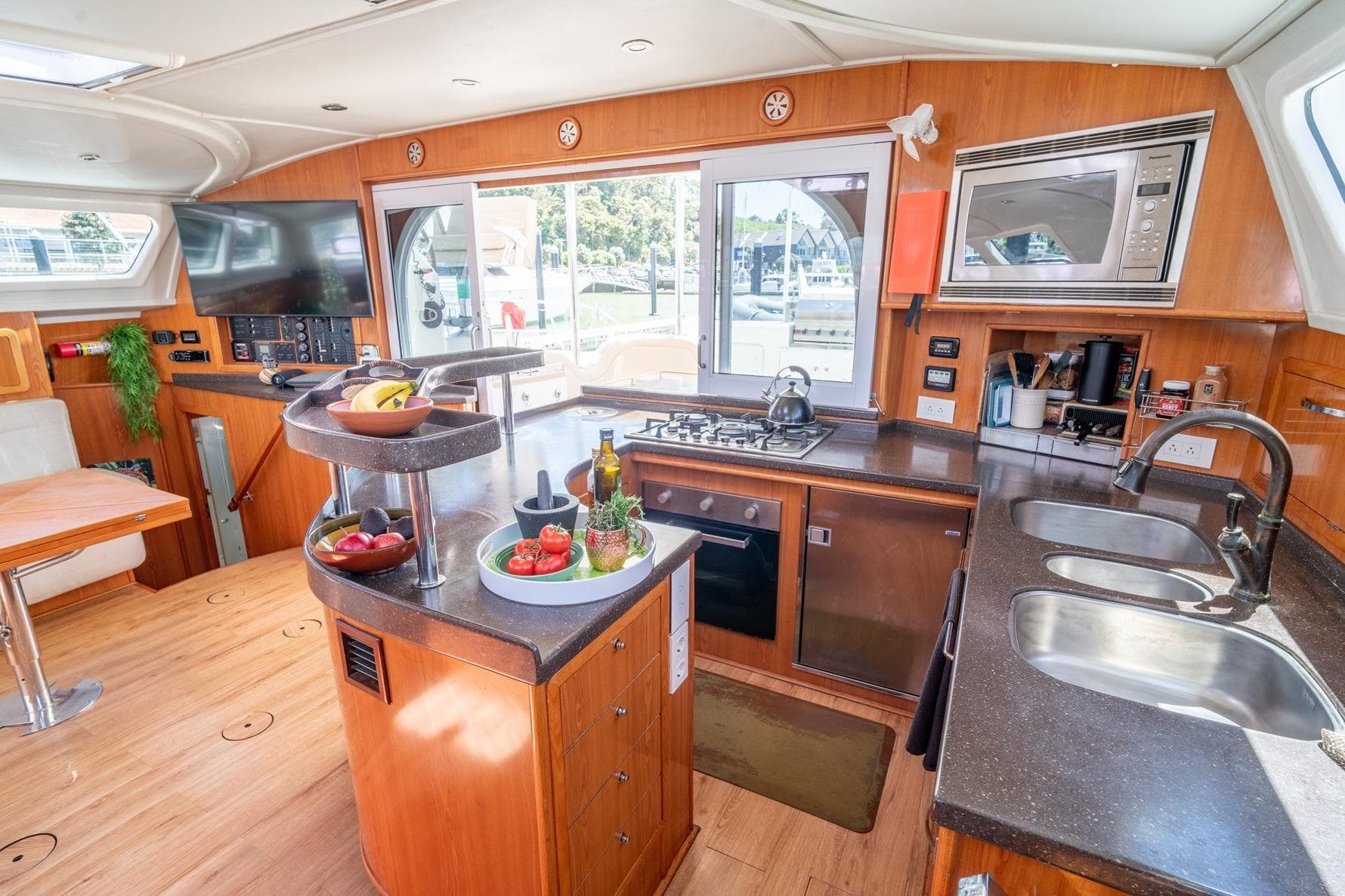 Luxurious kitchen interior of 2014 Royal Cape Majestic 530 yacht with modern amenities.