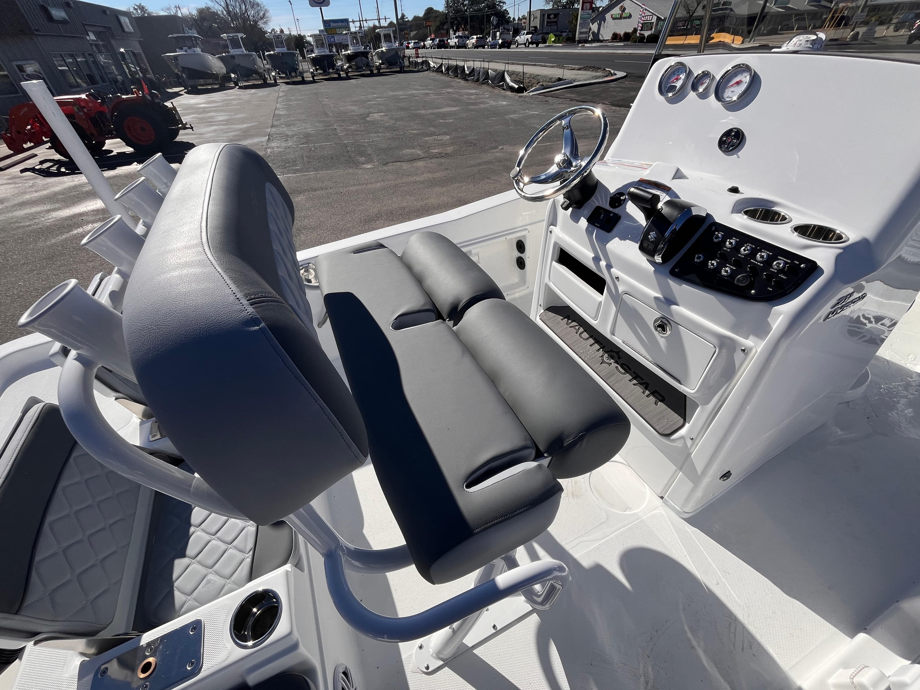 2025 NauticStar 211 Hybrid boat interior with modern console and seating.