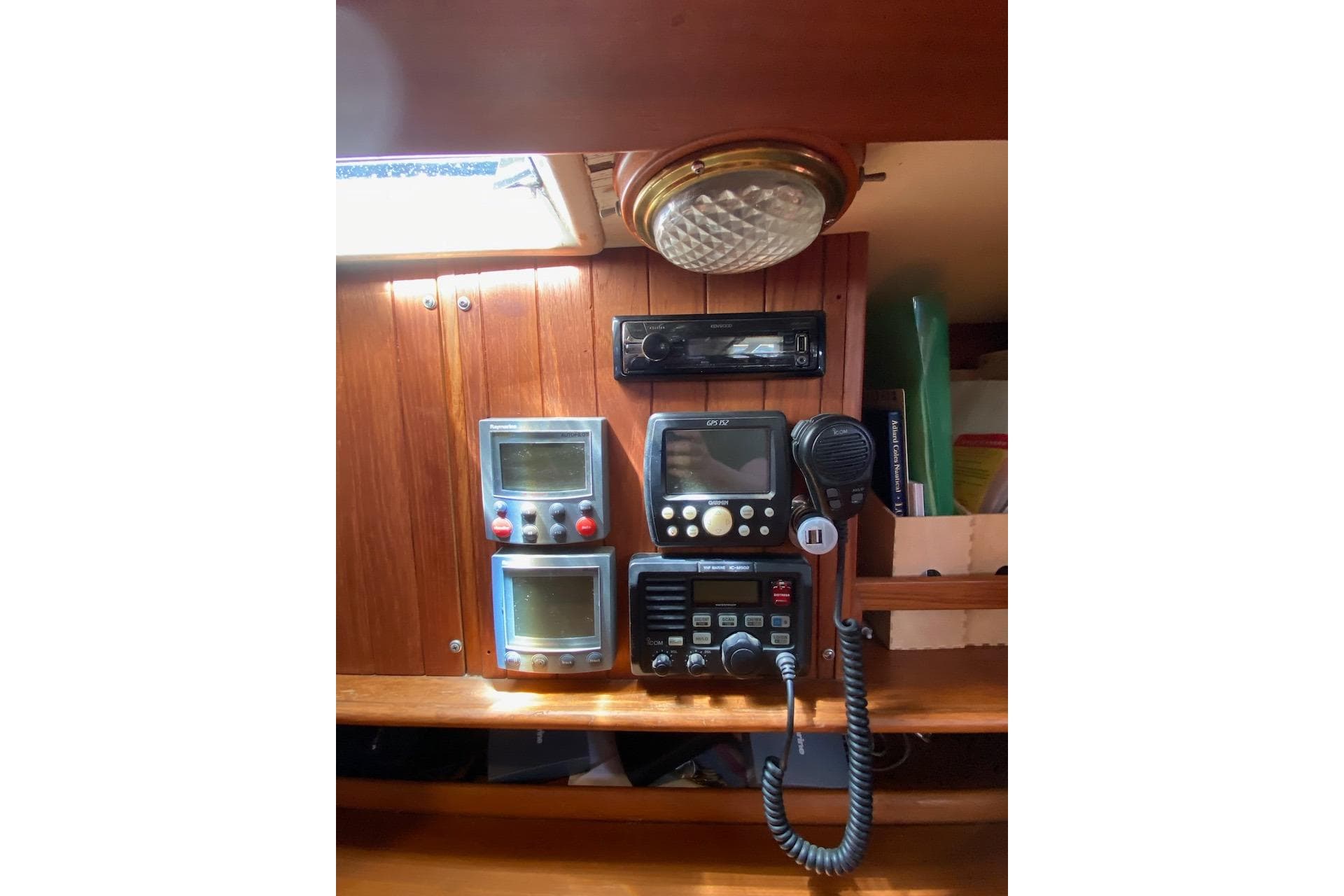 1985 Liberty 458 yacht control panel with navigation and communication equipment.
