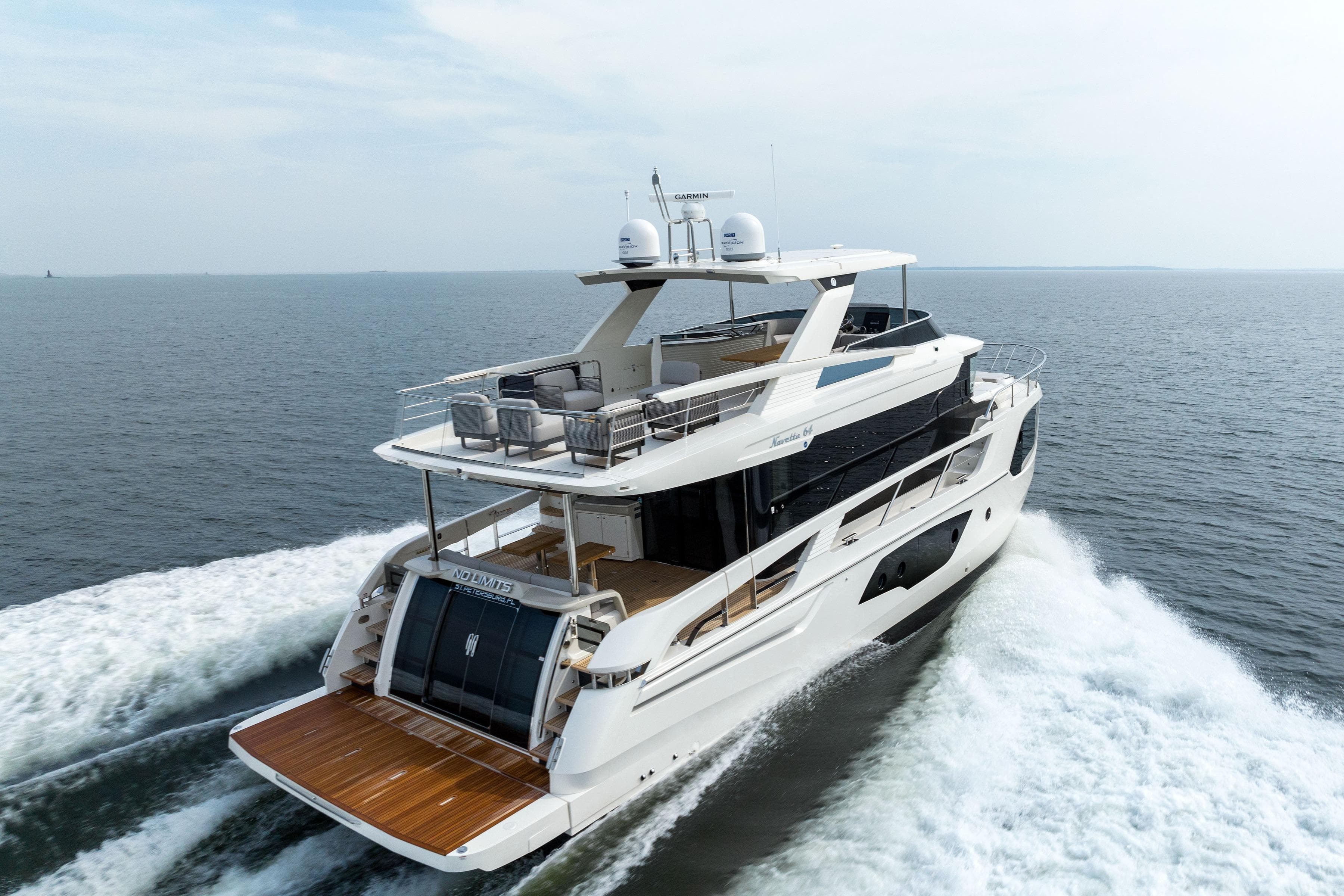 Absolute Navetta 64 Yacht 2024 cruising on open sea.